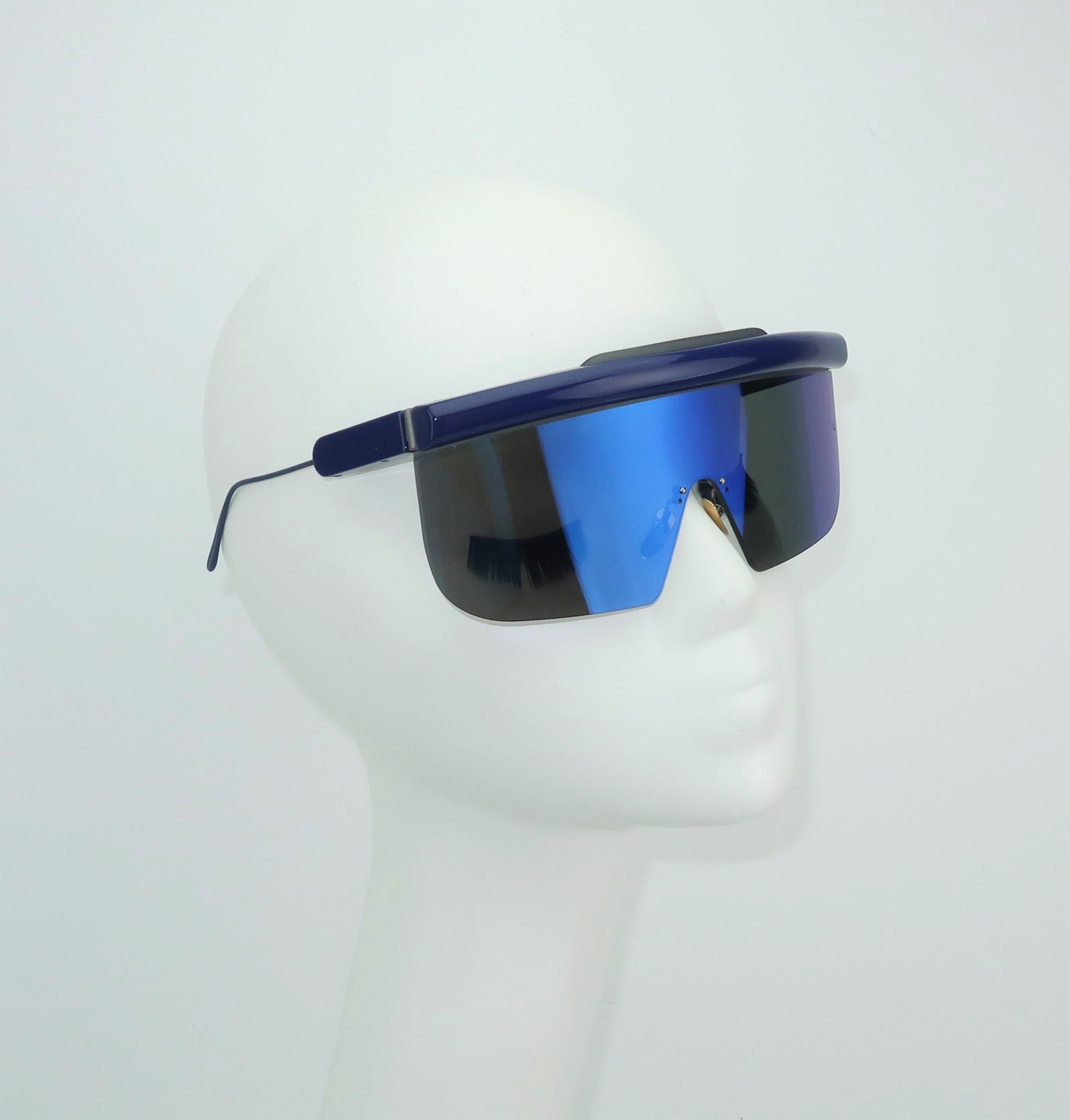 Jacques Marie Mage is a Los Angeles based designer of unique and limited edition eyewear including these handmade Italian space age style blue sunglasses.  This limited edition style (63 of a 200 count batch) is named 'Connie' after Halston's former