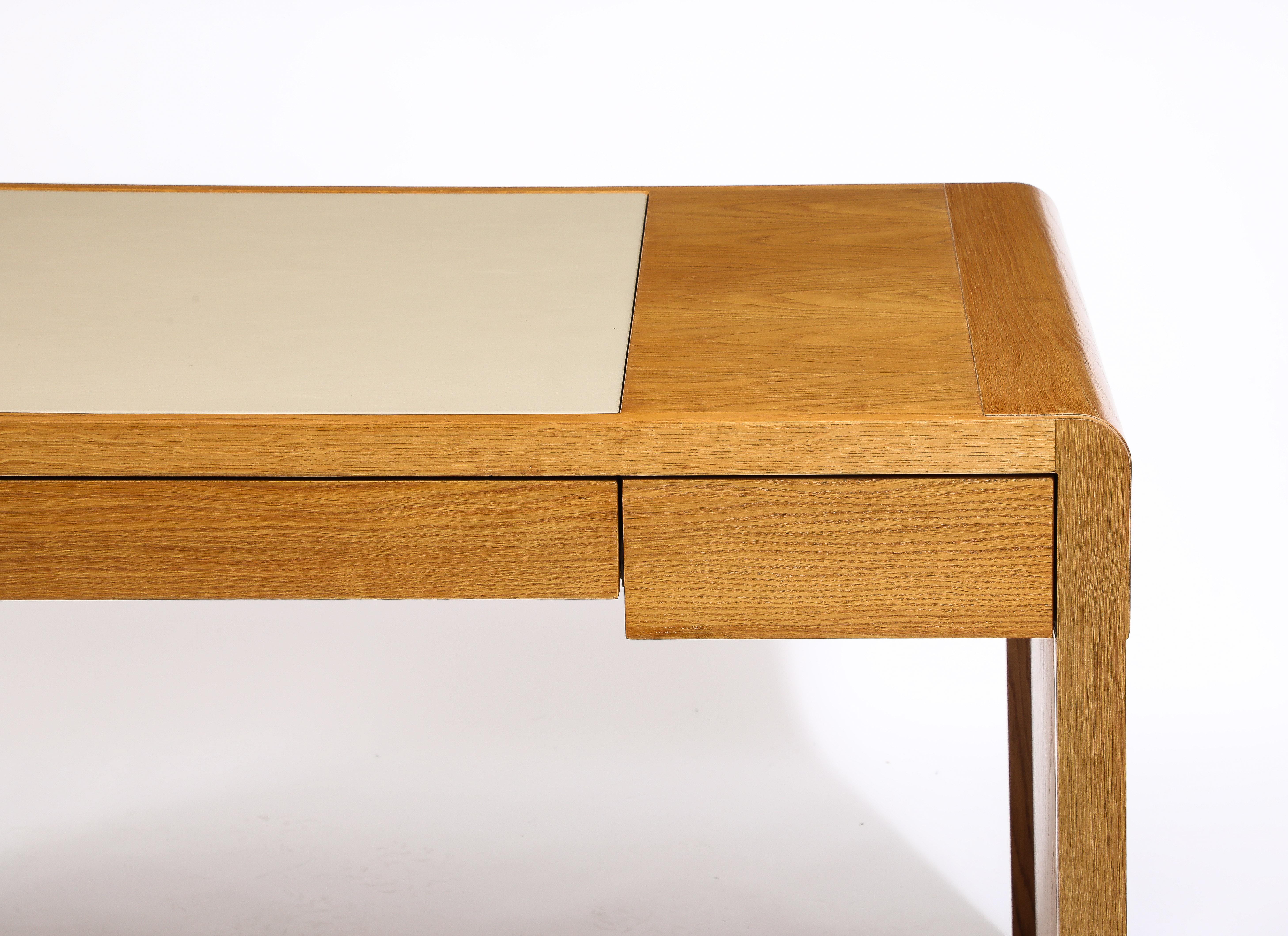 French Jacques Quinet Oak and Leather Waterfall Desk, France 1960's For Sale