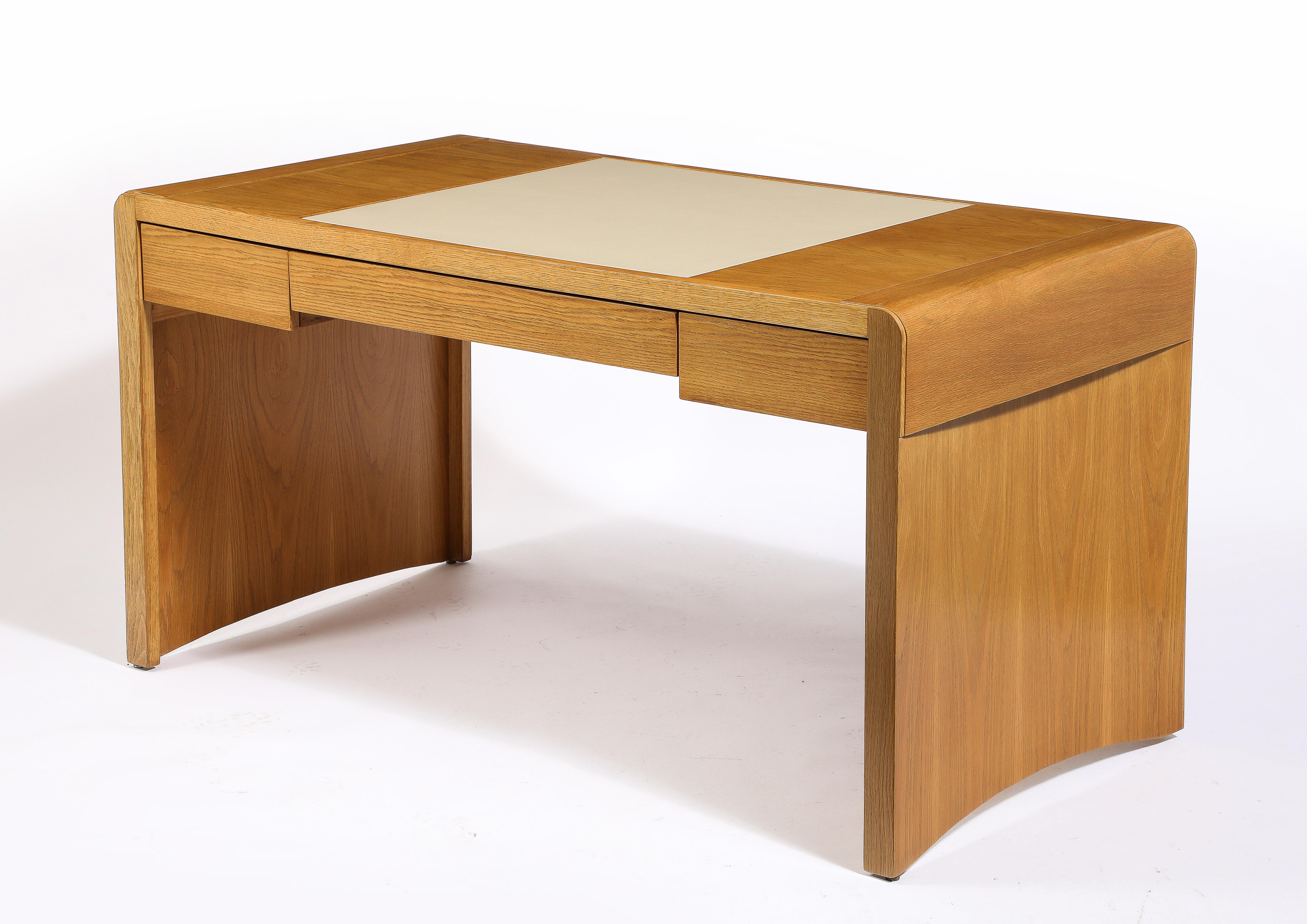 Jacques Quinet Oak and Leather Waterfall Desk, France 1960's In Good Condition For Sale In New York, NY
