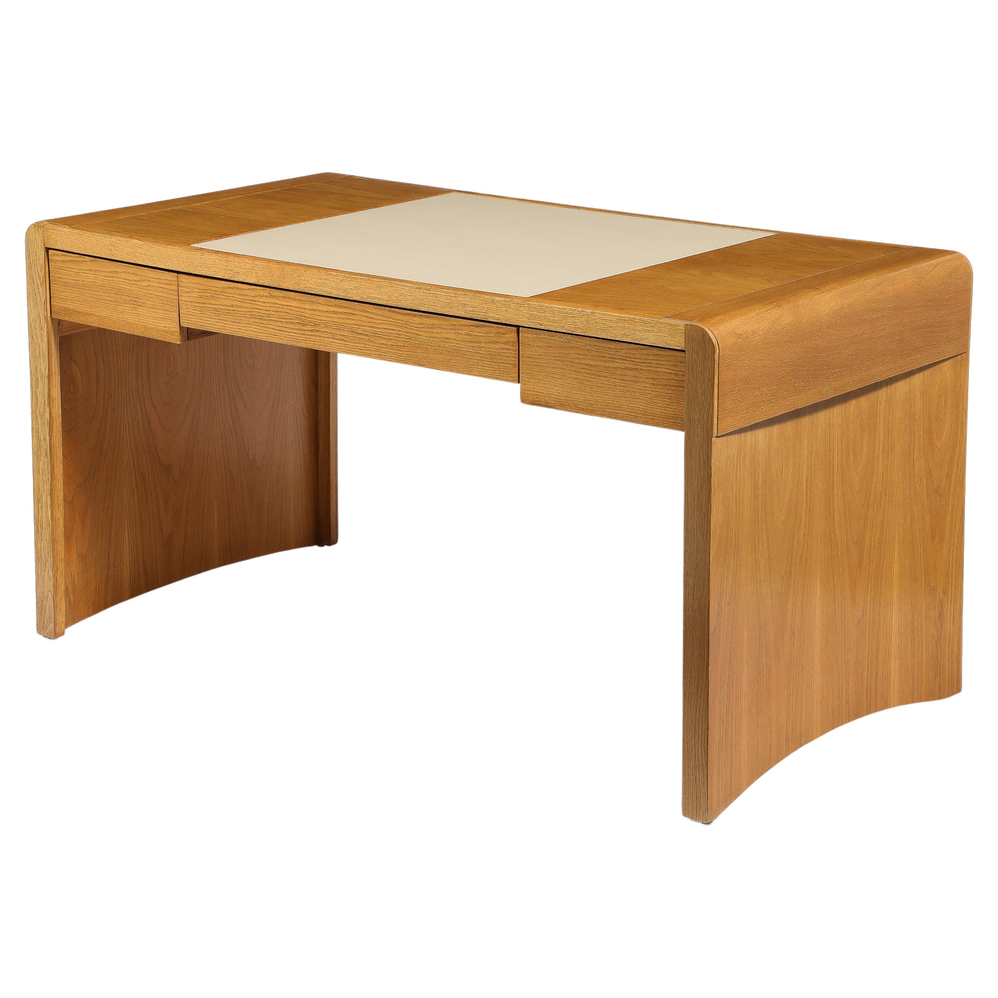 Jacques Quinet Oak and Leather Waterfall Desk, France 1960's For Sale
