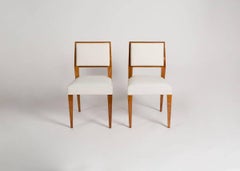 Jacques Quinet, Set of Eight Blond Mahogany Dining Chairs, France, circa 1950s