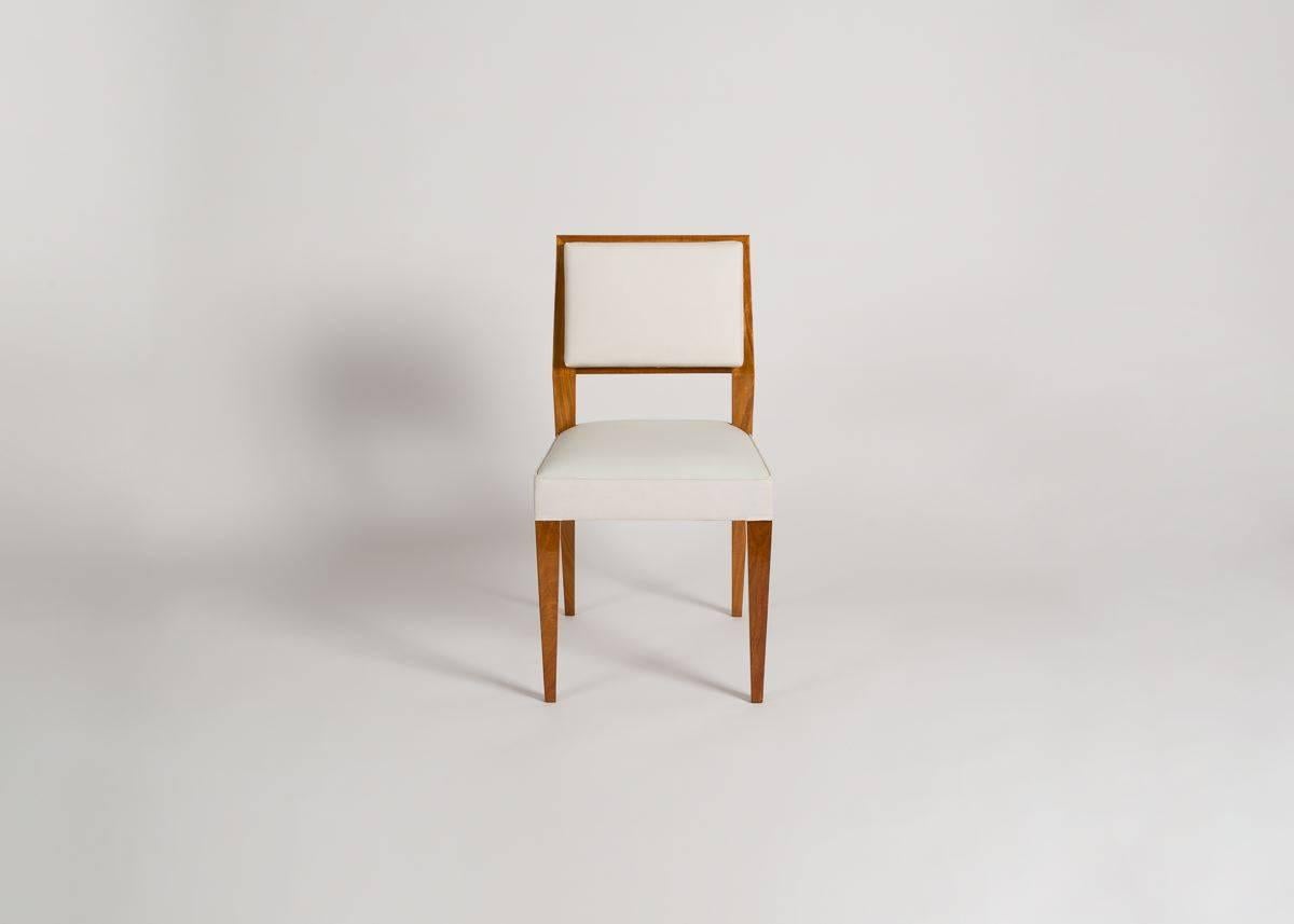 Jacques Quinet, Set of Eight Blond Mahogany Dining Chairs, France, circa 1950s In Good Condition In New York, NY