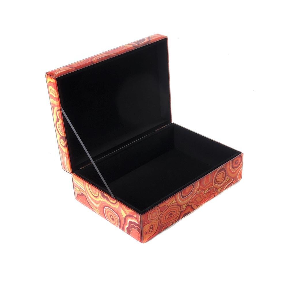 A decorative lidded box featuring an orange malachite pattern.
     