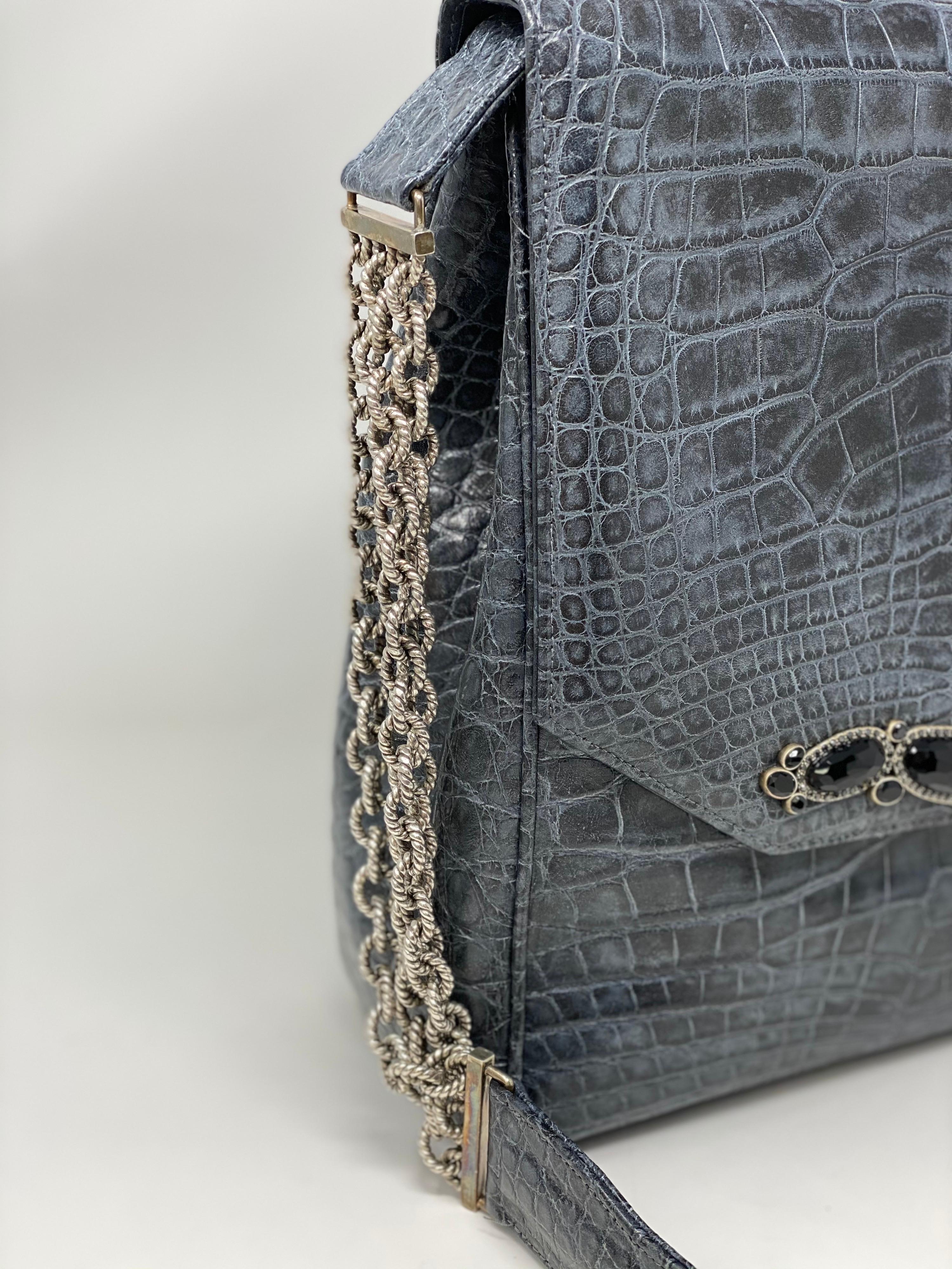 Jada Loveless Crocodile Bag. Beautiful jeweled handbag made of crocodile. Never used. Mint like new condition. Sterling silver chain. Guaranteed authentic. 
