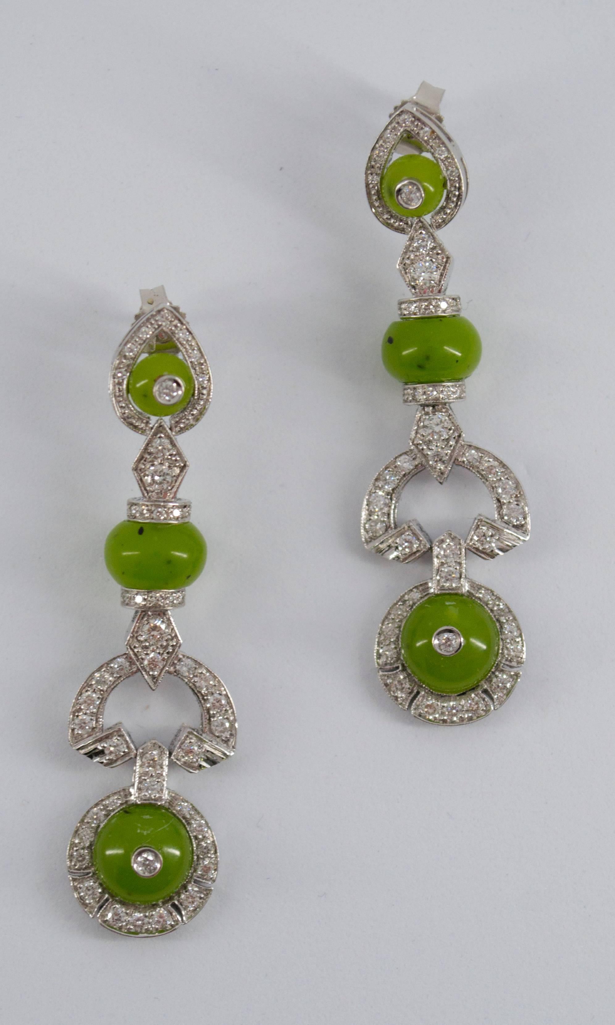 These earrings are made of 9k White Gold.
They have 0.55 Carats of White Diamond and Jade.
All our Earrings have pins for pierced ears but we can change the closure and make any of our Earrings suitable even for non-pierced ears.
We're a workshop so