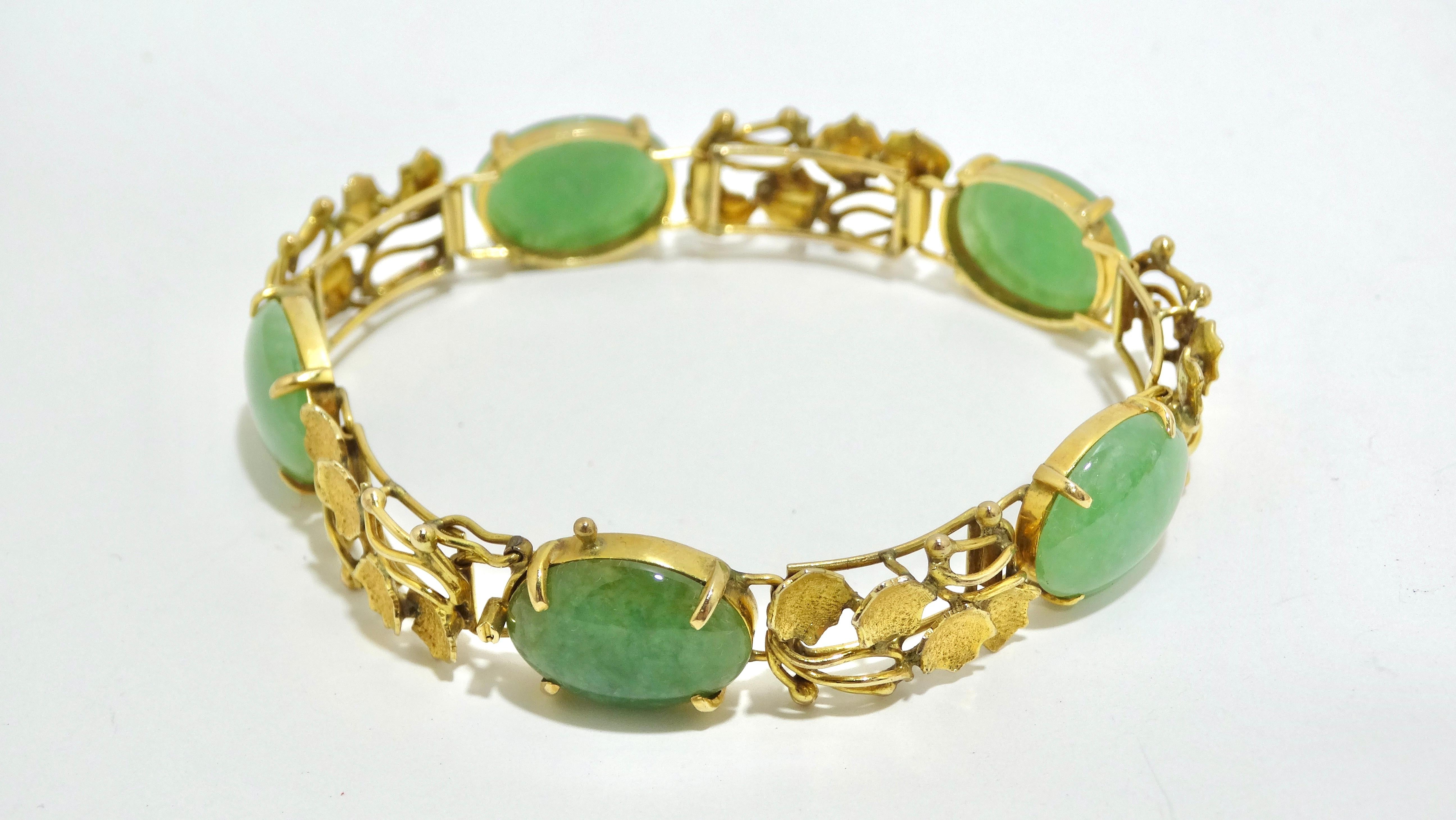 This bracelet has an undeniable beauty to it. This bracelet included 5 oval-cut jade stones surrounded by ornate and delicate leaf detailing in 14k gold. The jade stone is often times referred to as the stone of luck and happiness. Jade is known to