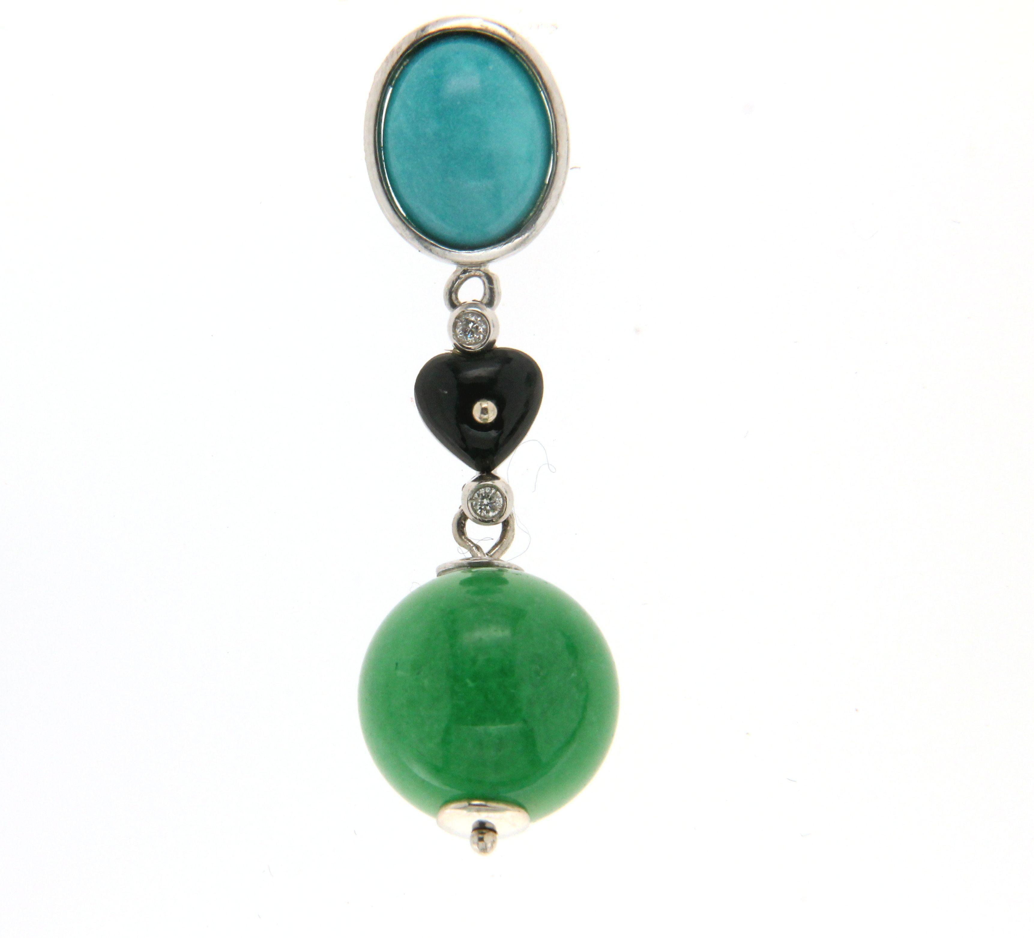 Jade 18 karat white gold mounted with turquoise onyx and diamonds drop earrings

Earrings total weight 10.10 grams
