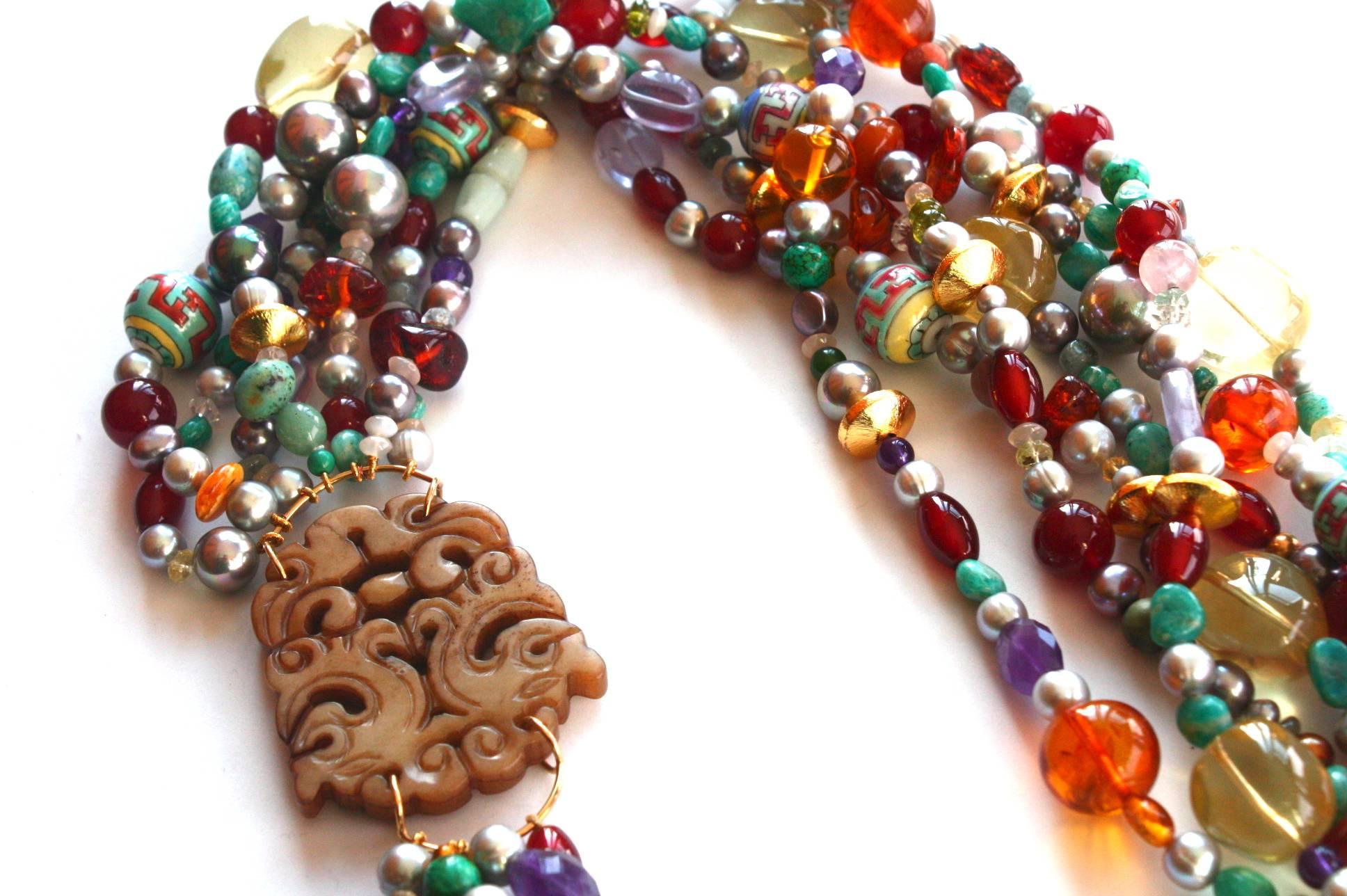 Very special long necklace with to dragon carved jade plaque, antiques Chinese murrine, amber, amethyst, jade, Citrine, carnelian. total length 110cm.
All Giulia Colussi jewelry is new and has never been previously owned or worn. Each item will