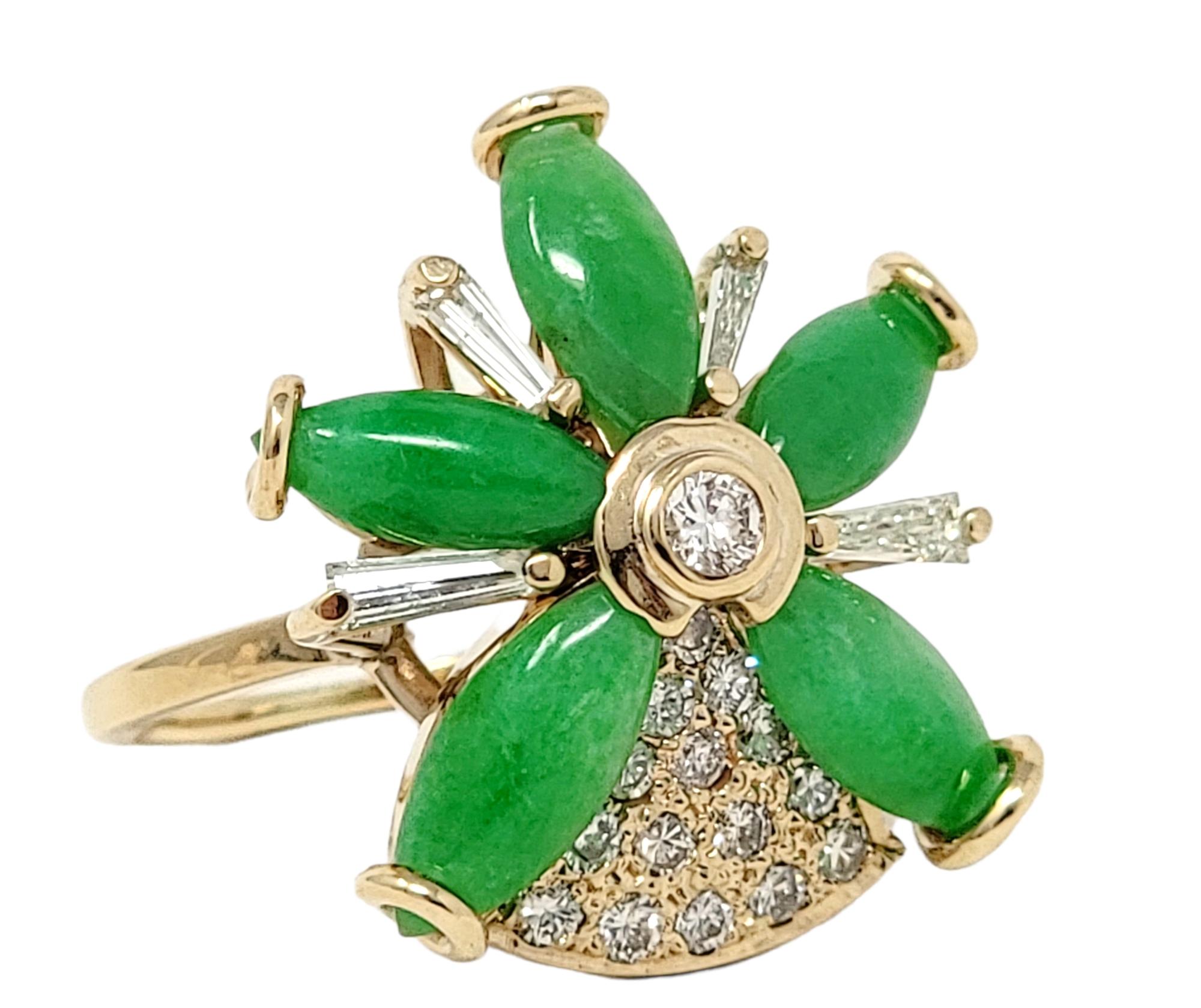 Ring size: 6.75

Unique jade and diamond flower ring will add both color and charm to your finger!  The sparkling cocktail style ring features a 5 cabochon jade petals with a single bezel set diamond at the center, as well as diamond accents around