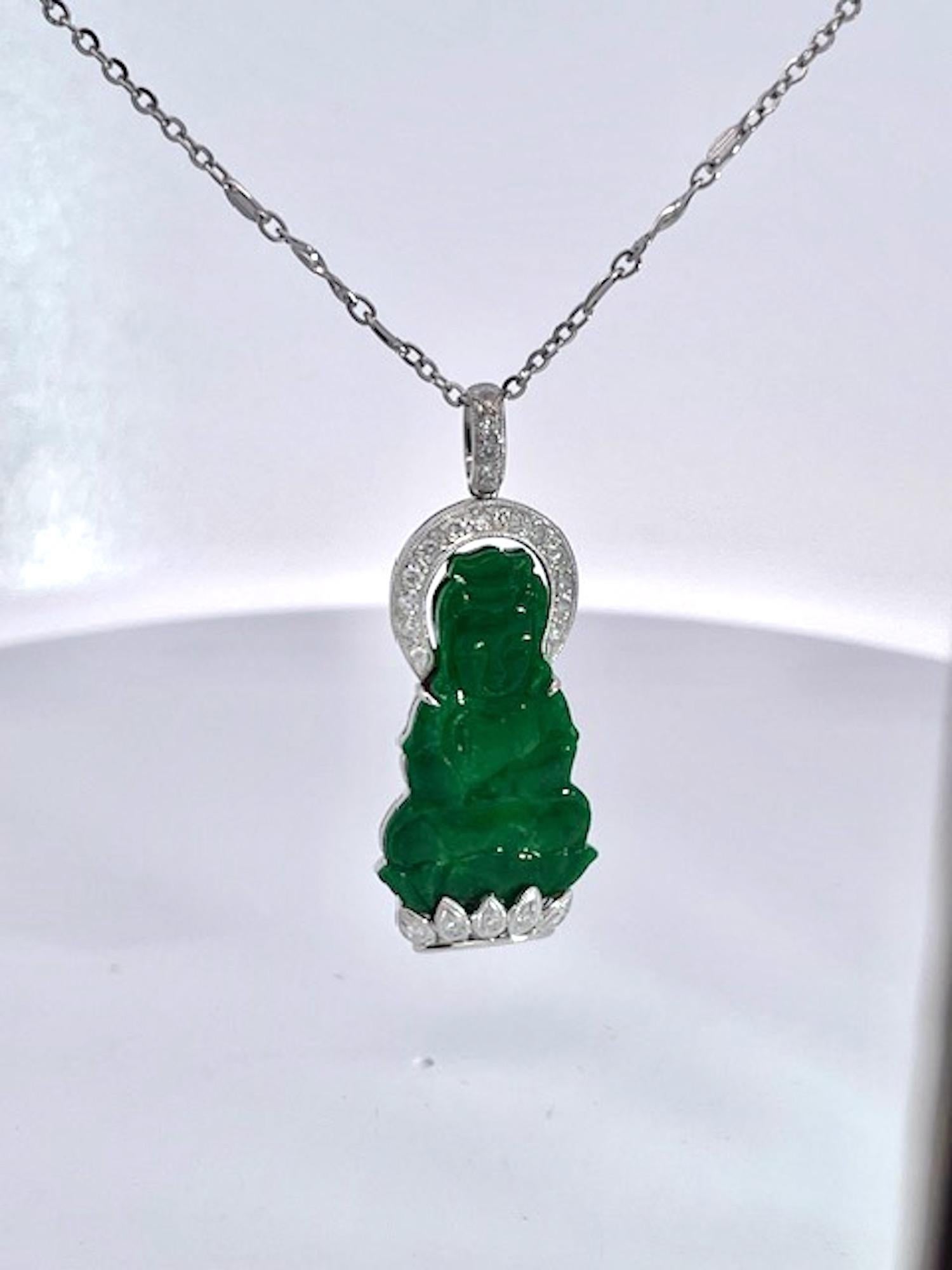 This Guanyin pendant is just beautiful.  The pendant depicts a buddha and has a crown in Diamonds and the base of the pendant in Diamonds.  This is new and never used.  I purchased these to go with my jade pendant earrings, (in another listing) but