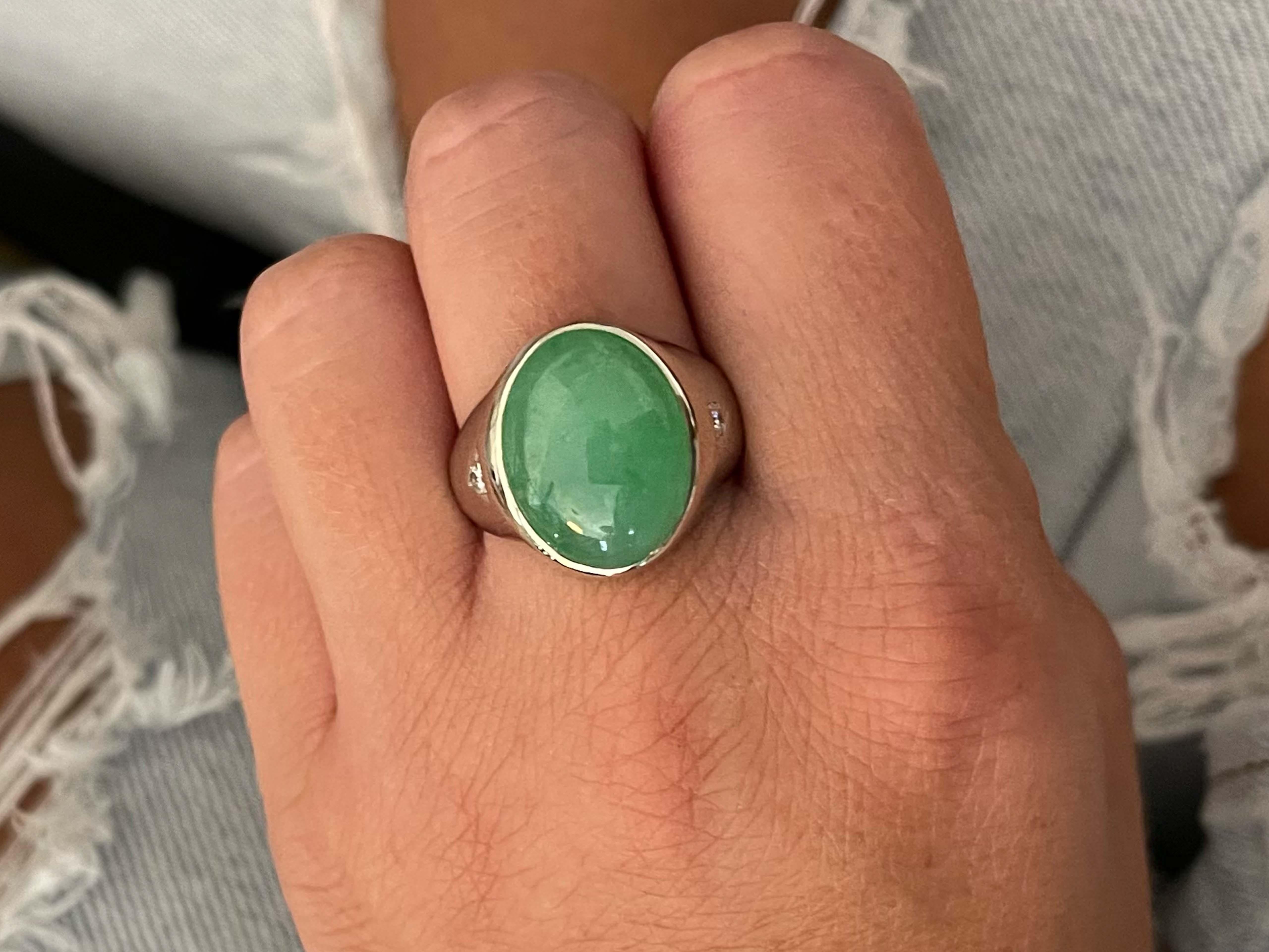 Item Specifications:

Metal: 14k White Gold 

Style: Statement Ring

Ring Size: 10.25 (resizing available for a fee)

Total Weight: 15.5 Grams

Gemstone Specifications:

Center Gemstone: Jadeite Jade

Shape: Oval

Color: Green

Cut: Cabochon 

Jade