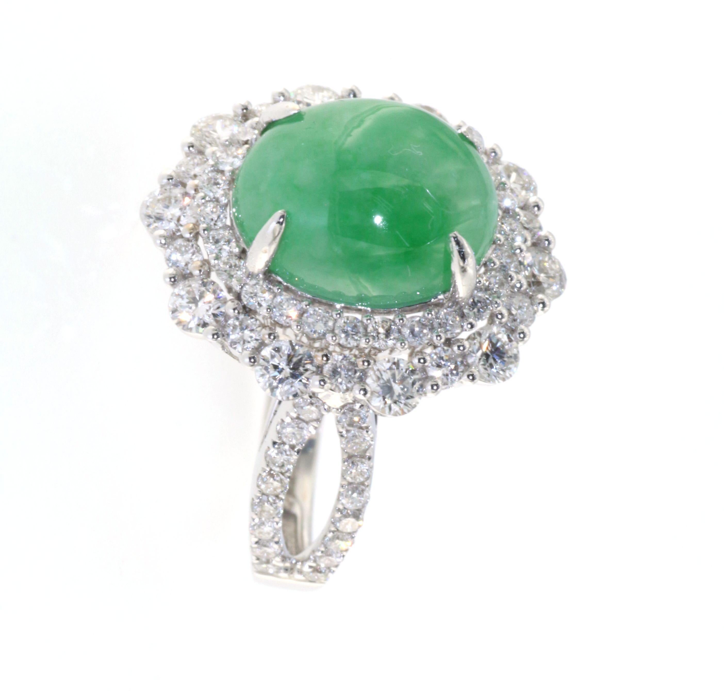 Introducing our Timeless style Jadeite and Diamond Ring in 18 Karat White Gold. This exquisite ring combines the allure of jadeite and the brilliance of diamonds, creating a stunning piece that exudes elegance and sophistication. The main stone of
