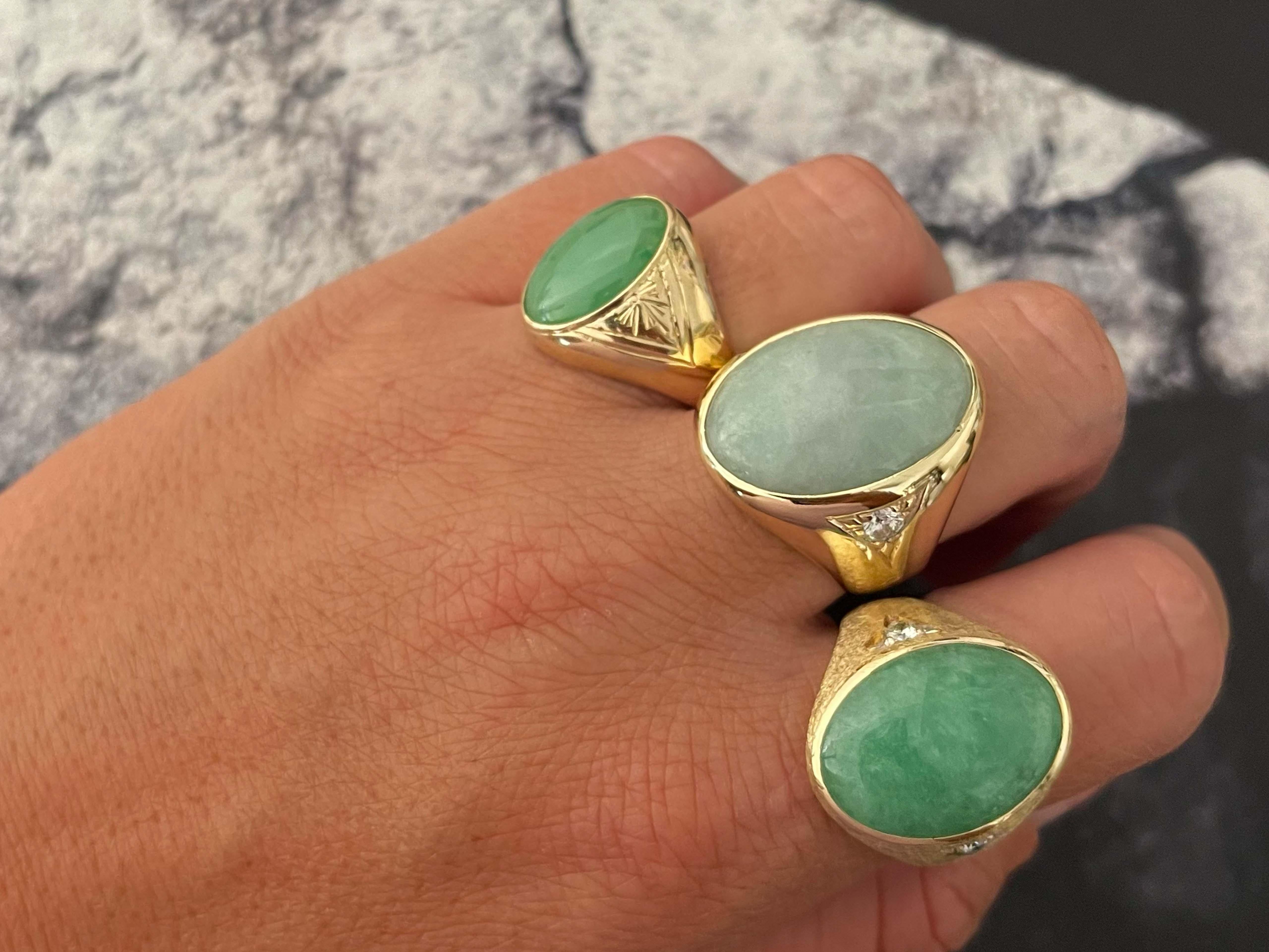 Item Specifications:

Metal: 14k Yellow Gold 

Style: Statement Ring

Ring Size: 9 (resizing available for a fee)

Total Weight: 10.6 Grams

Gemstone Specifications:

Center Gemstone: Jadeite Jade

Shape: Oval

Color: Green

Cut: Cabochon

Jade