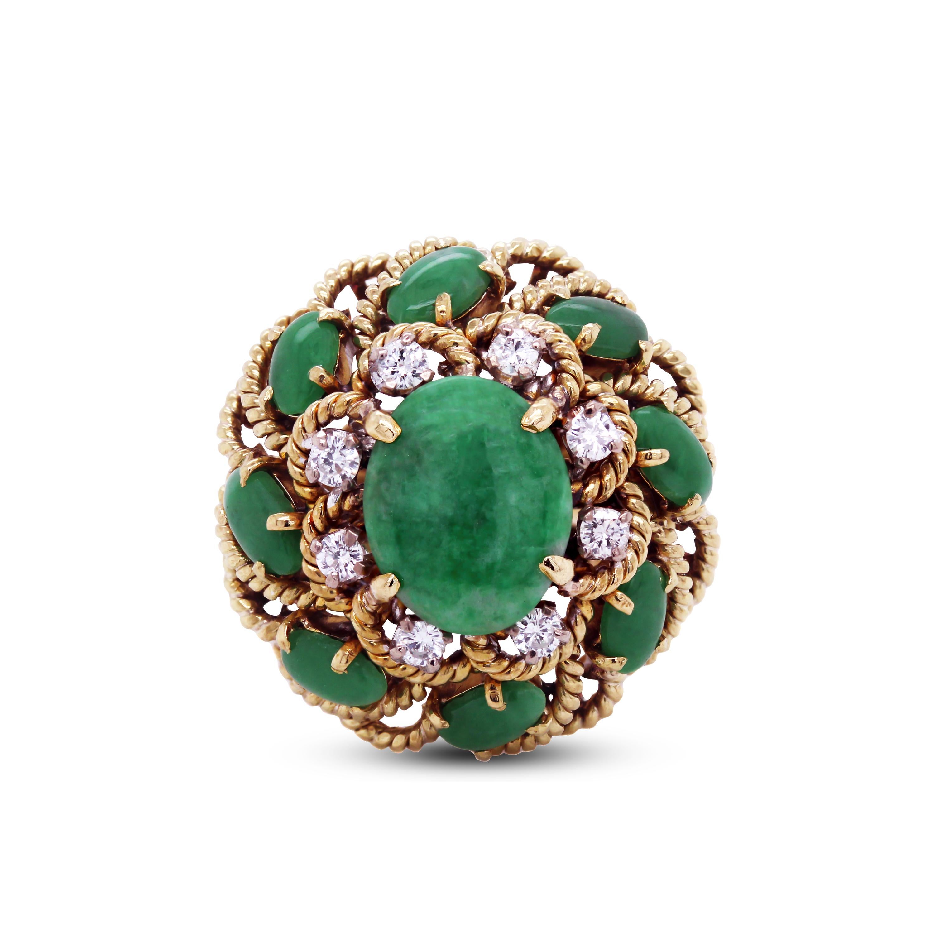 18K Yellow Gold Cocktail Ring with Jade and Diamonds

This estate piece features eight Jades on the edges surrounded by hand-twisted gold wire design work.

All jades are oval-cut.

0.24 carat G color, VS clarity diamonds total weight

Size 6.5.