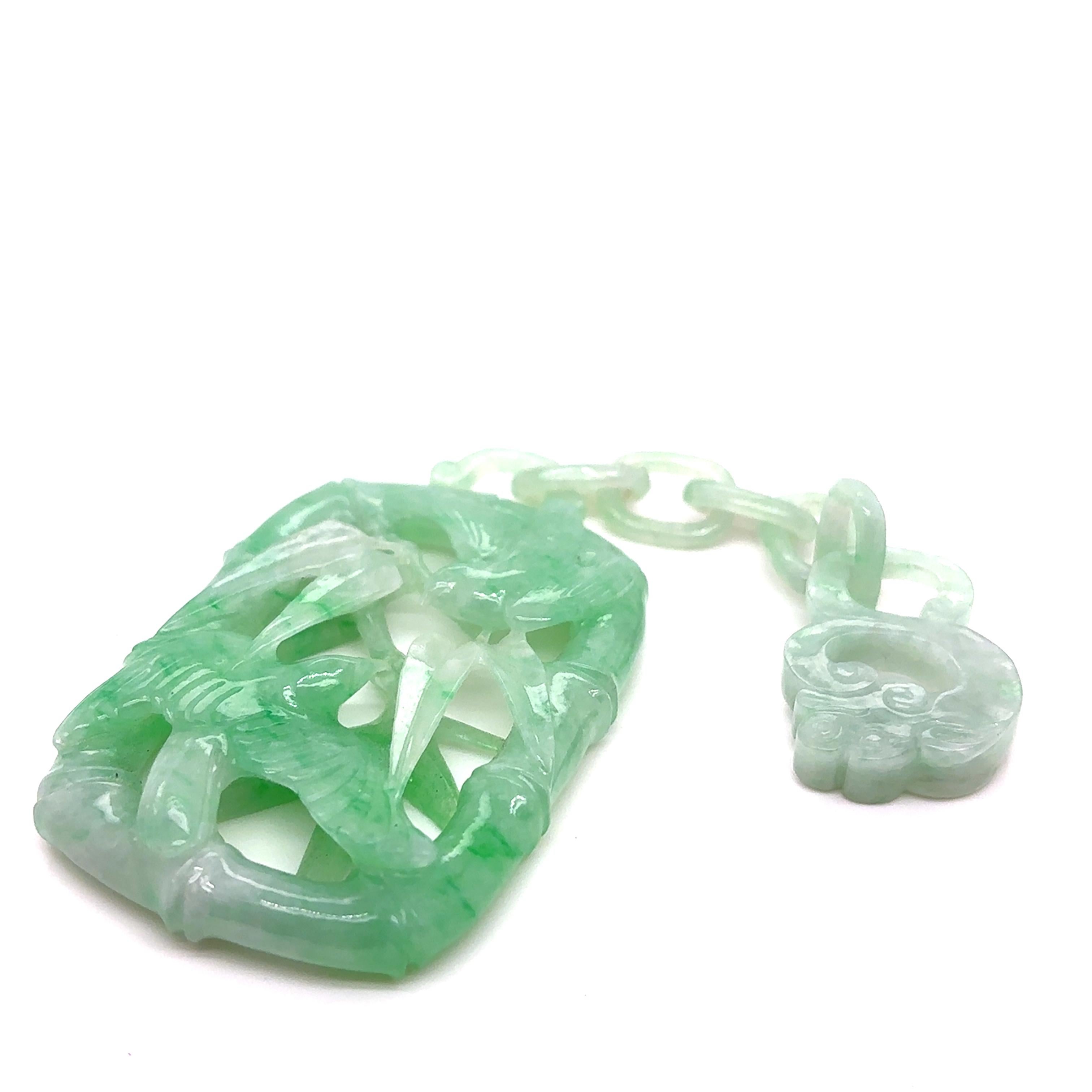This stunning Jade Bamboo & Bird Carving (130 x 40mm) is a masterpiece of nature and craftsmanship, sourced from Myanmar, a region renowned for its high-quality jade. 

The intricate design features bamboo, symbolizing strength and resilience,
