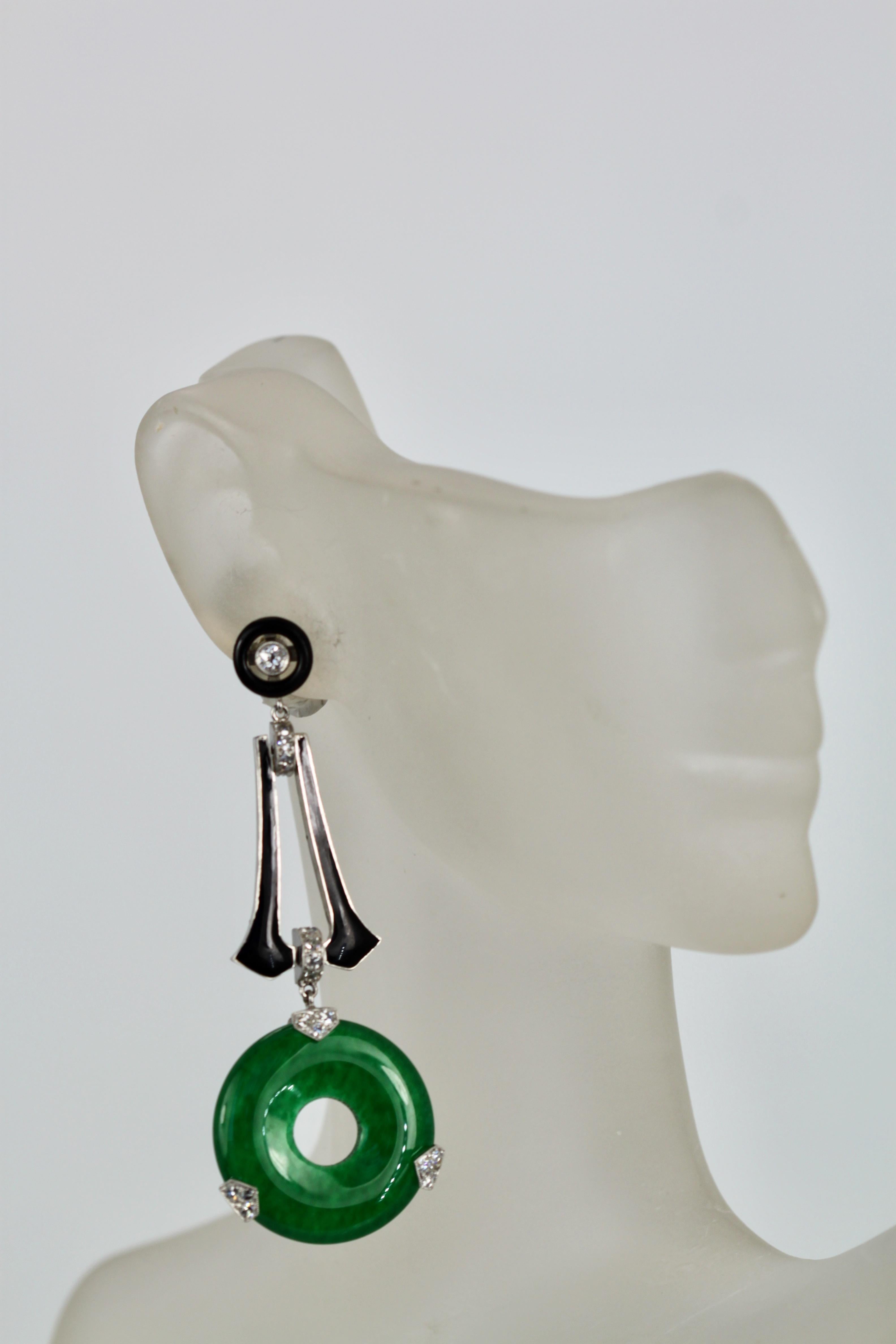 These beautiful Jade Black Enamel Diamond earrings are set with black enamel and Diamond accents.  These earrings are 2 1/2