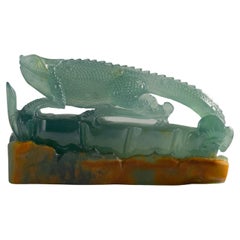 Scultura in giada di iguana in giada verde bluastra del Guatemala certificata