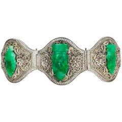 Jade Carvings Set in Wide Silver Hand-Carved Bracelet, circa 1920, China