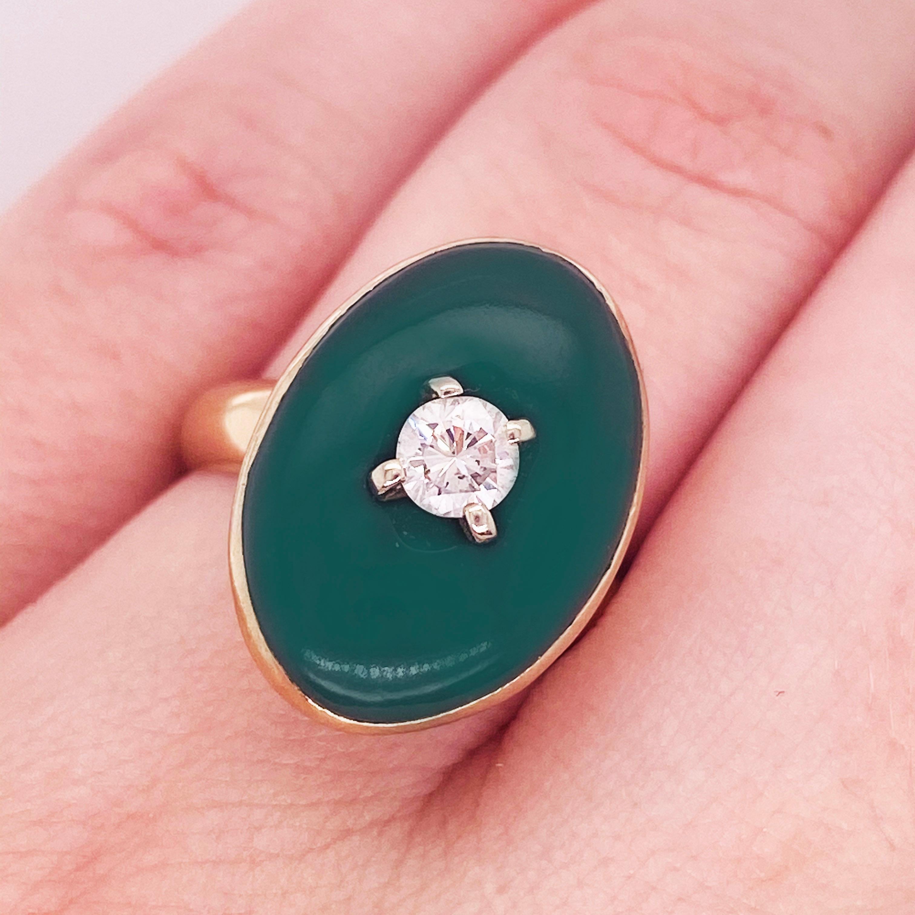 Circa 1975. What makes this Jade ring so amazing is the oval and bezel set. Drilled into the center of the jade is a lovely sized diamond! The details for this ring are listed below:
Metal Quality: 14K Yellow Gold
Gemstone: Jade
White Diamond- .25