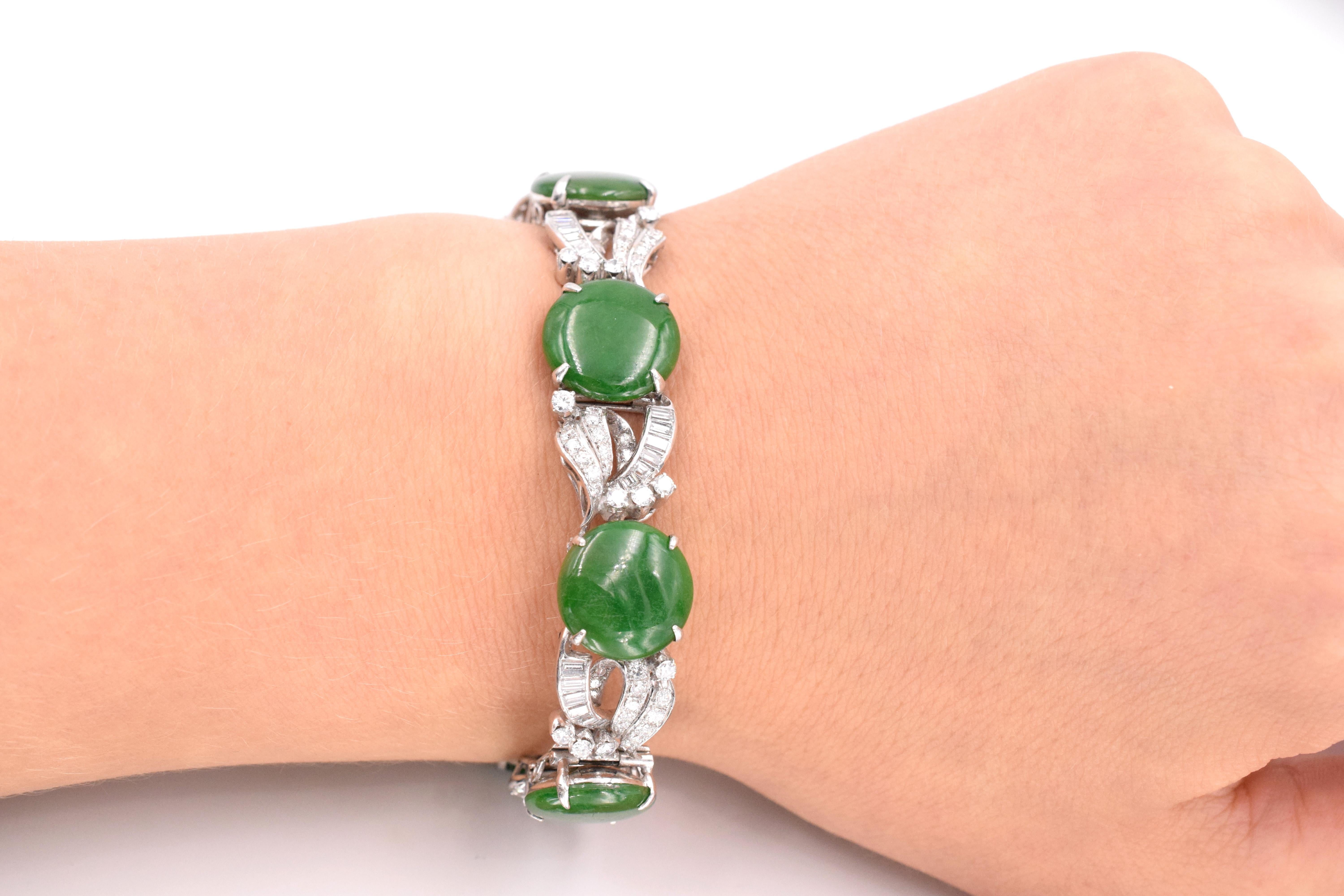 Timeless vintage jade and diamond bracelet!
beautiful green 6 disc shape jades separated by diamond links.
Total weight of jade is app. 35 carats
Total weight of diamonds is: 6 carats 
Diamonds are set in platinum
Bracelet length is 7.5 inches
Width