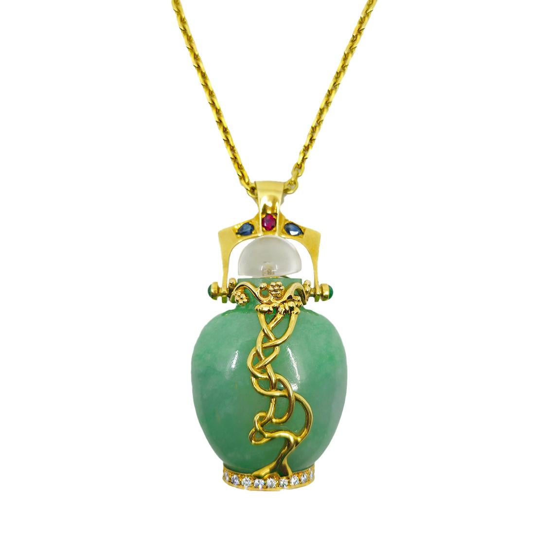 This exquisite perfume bottle pendant by Ferrar is a masterful composition of Type A jade, diamonds, rubies, blue sapphires, glass, and 18-karat yellow gold. Weighing 120.3 grams and measuring 3.25” x 1.68”, it comes with a certificate