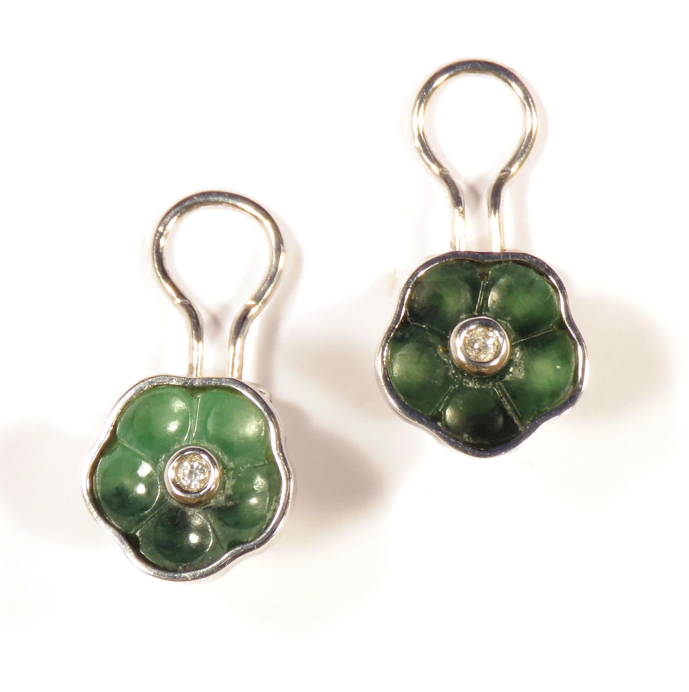 18 karat white gold clip-on earrings with flowers jades and two diamonds 0.10 ctw. The circumference of each jade gemstone is 13 mm /  0.511 inches. These clip-on earrings are marked with the Italian Gold Mark 750 and Botta Gioielli brandmark