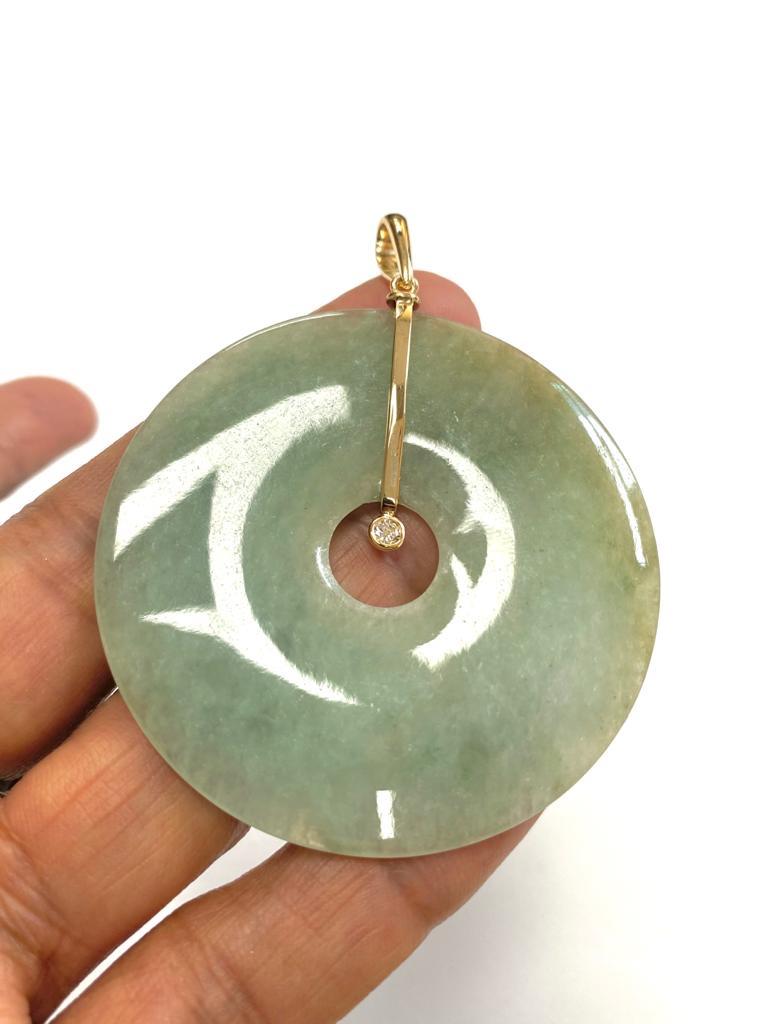 Contemporary Goshwara Jade Donut Pendant For Sale