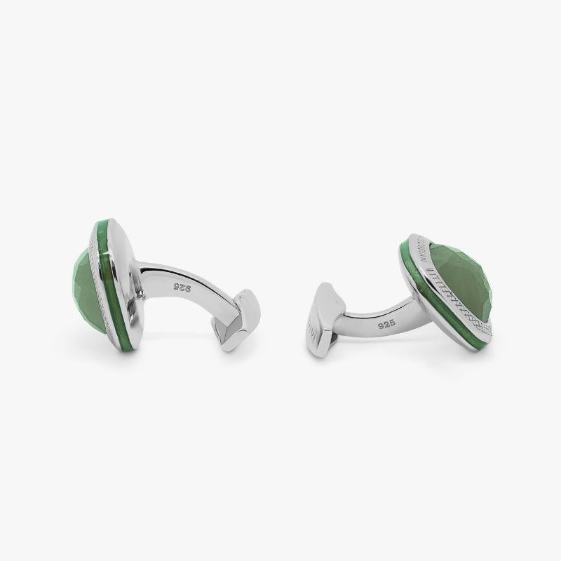 Jade Doppione Cushion Cufflinks in Sterling Silver

Rose cut Jade sits below a cabochon of quartz, cleverly combined to create a 'doublet'. This unusual collaboration of semi-precious stones inlay our classic square case, with green enamel detailing