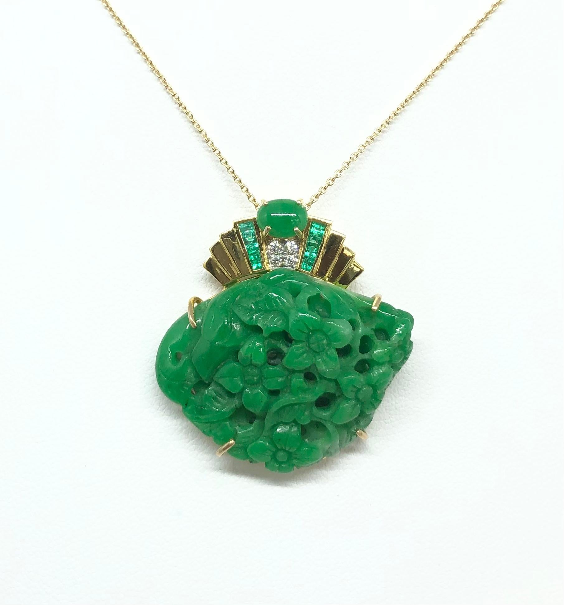 Jade 39.14 carats, Jade 0.66 carat, Emerald 0.29 carat and Diamond 0.06 carat Pendant set in 18 Karat Gold Settings
(chain not included)

Width: 3.0 cm 
Length: 3.1 cm
Total Weight: 11.21 grams

