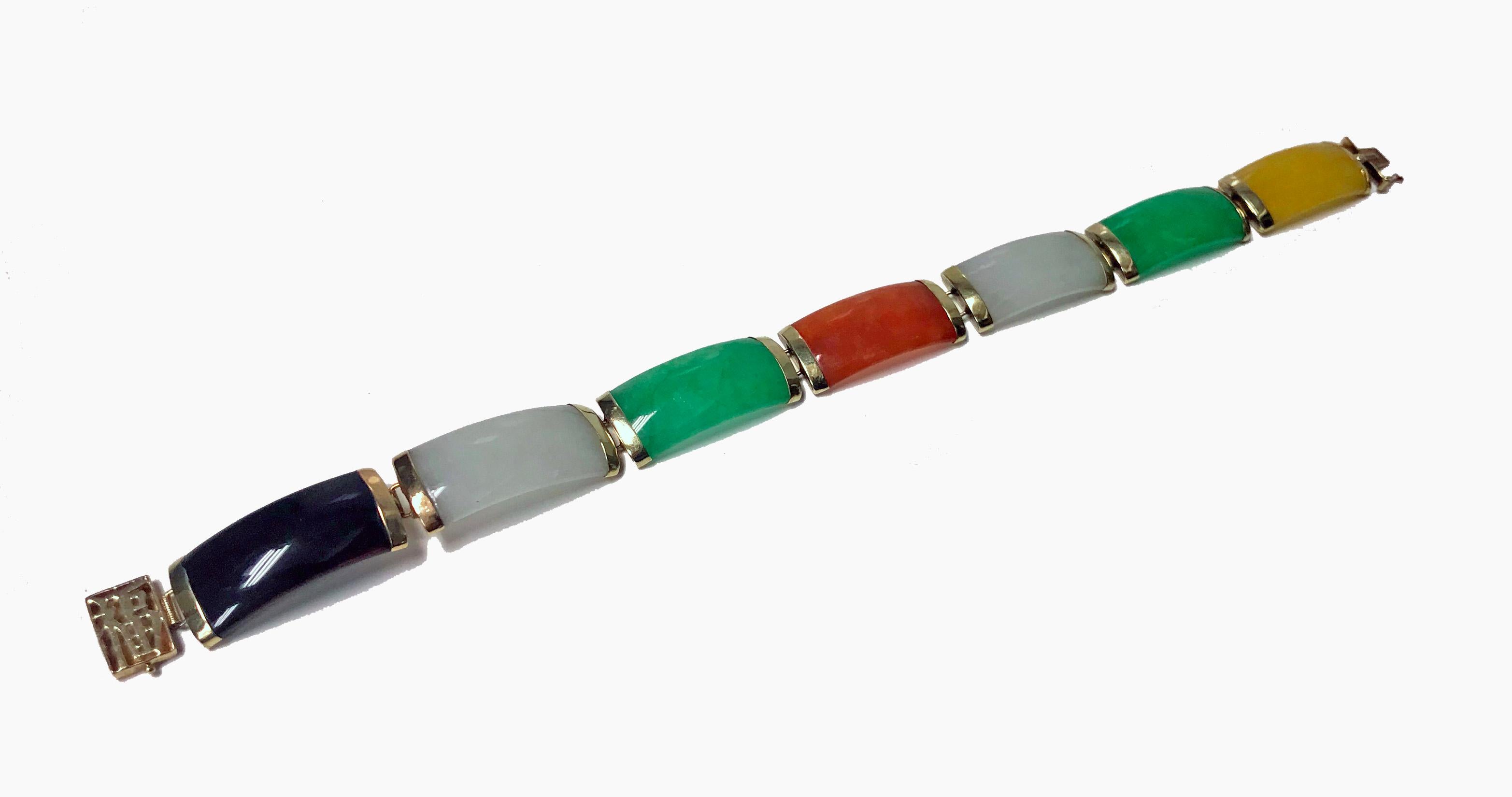 Fine Jade and Gold panel Bracelet, 20th century. Vintage Bracelet gold set with various medium green, orange, lavender, honey yellow and dark purple brown curvilinear jade panels. All tested for jadeite jade. Asian character clasp stamped 14K 585,