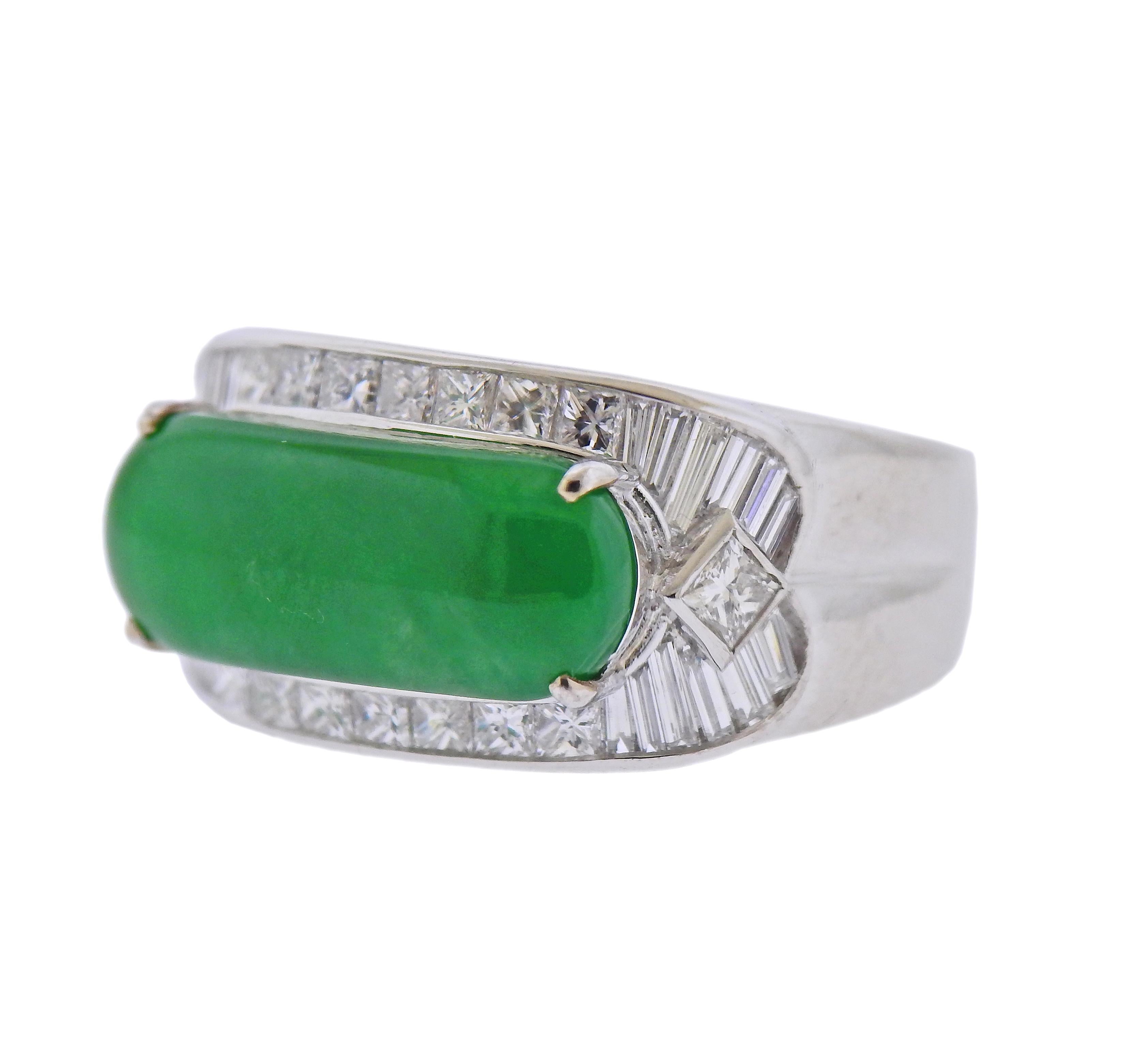 18k white gold ring, with 18.5mm x 7.4mm jade, surrounded with approx. 1.30ctw in diamonds. ring size - 8.5, ring top is 12.5mm wide. Marked 750. Weight - 12.1 grams.