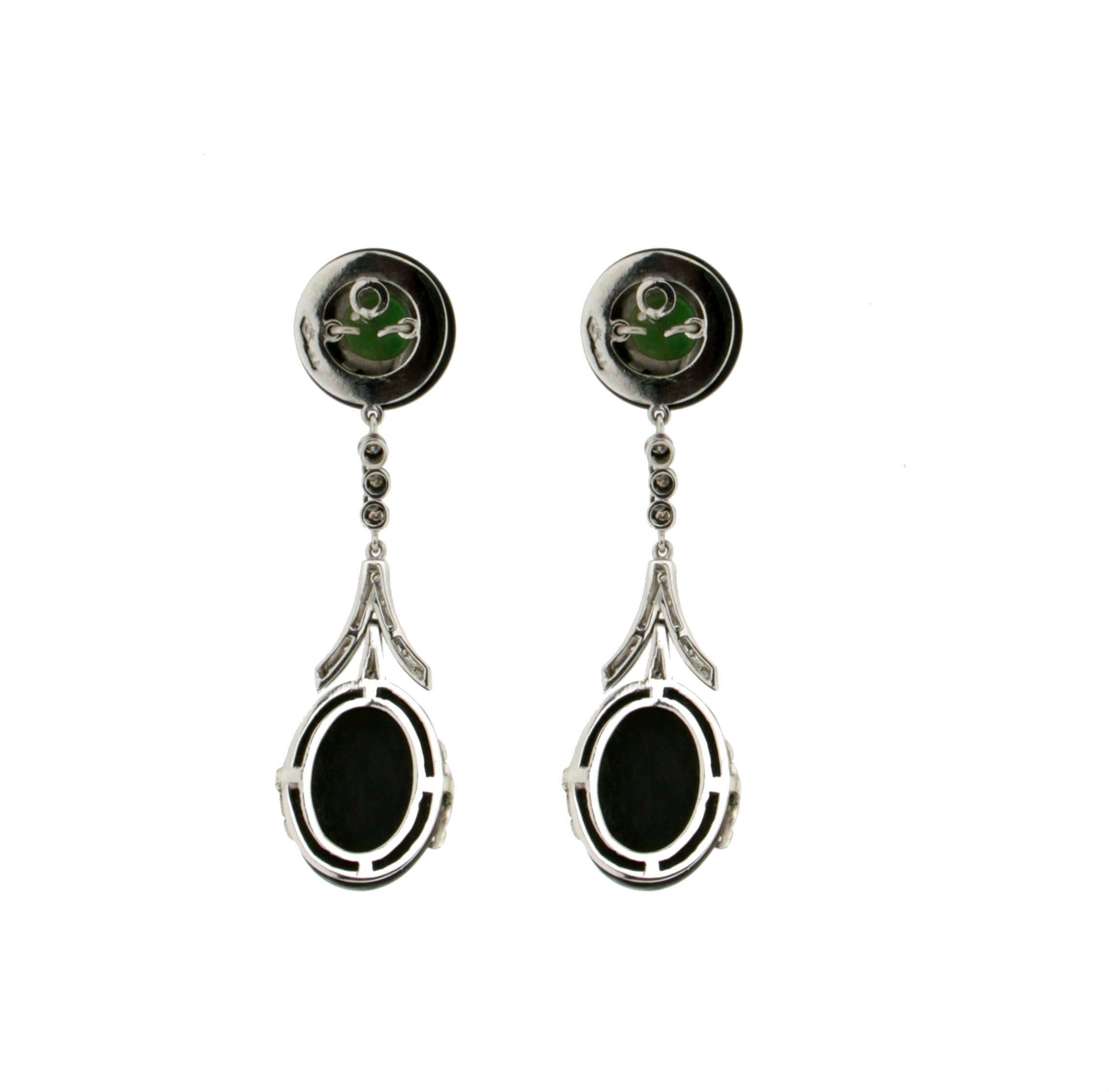 Jade White Gold 18 Carat Onyx Diamonds Drop Earrings

Earrings gold weight 11.30 grams
Earrings total weight 18.40 grams
Diamonds weight 0.70 carat
Jade weight 4.90 grams
