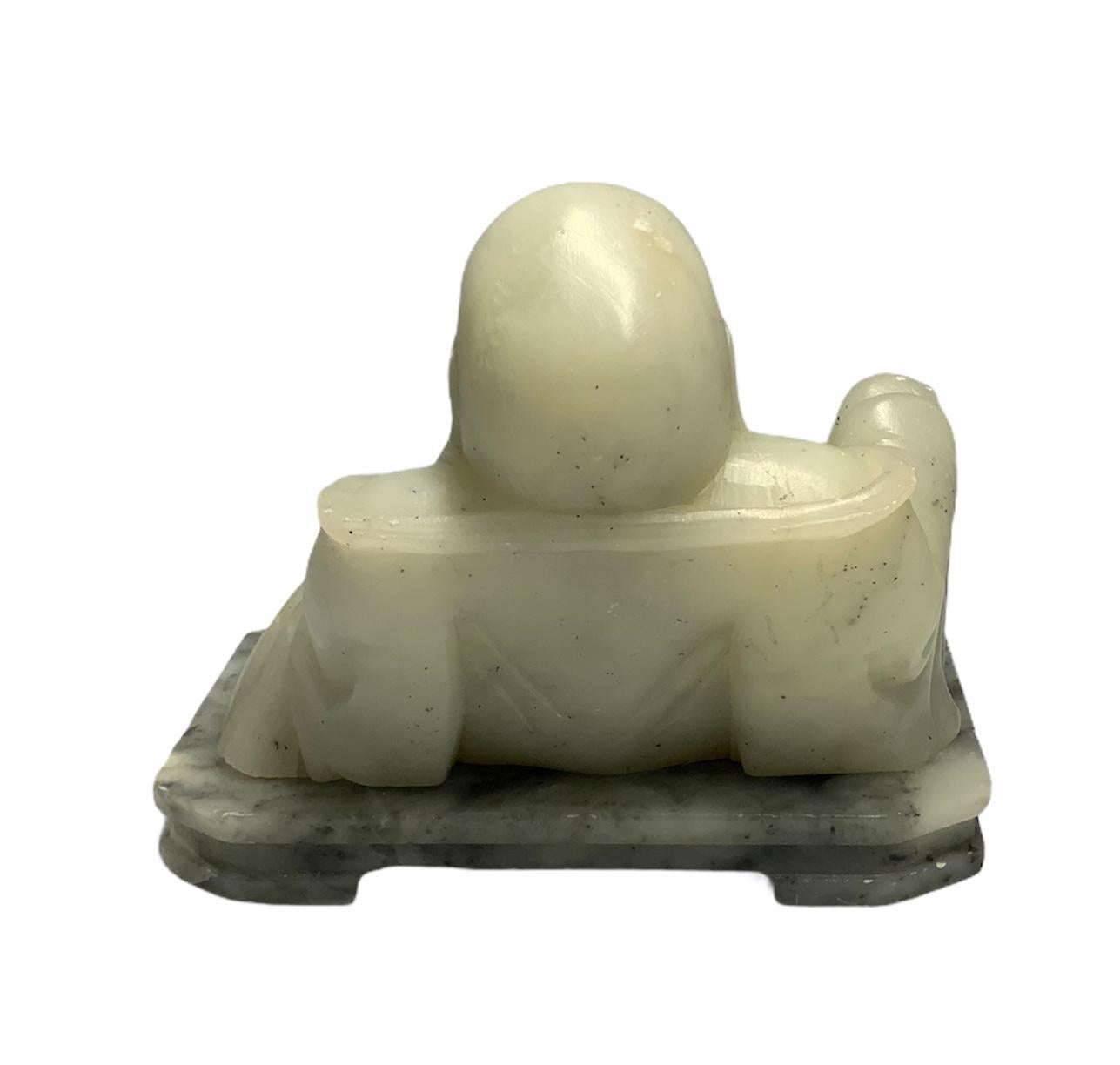 jade happy buddha statue