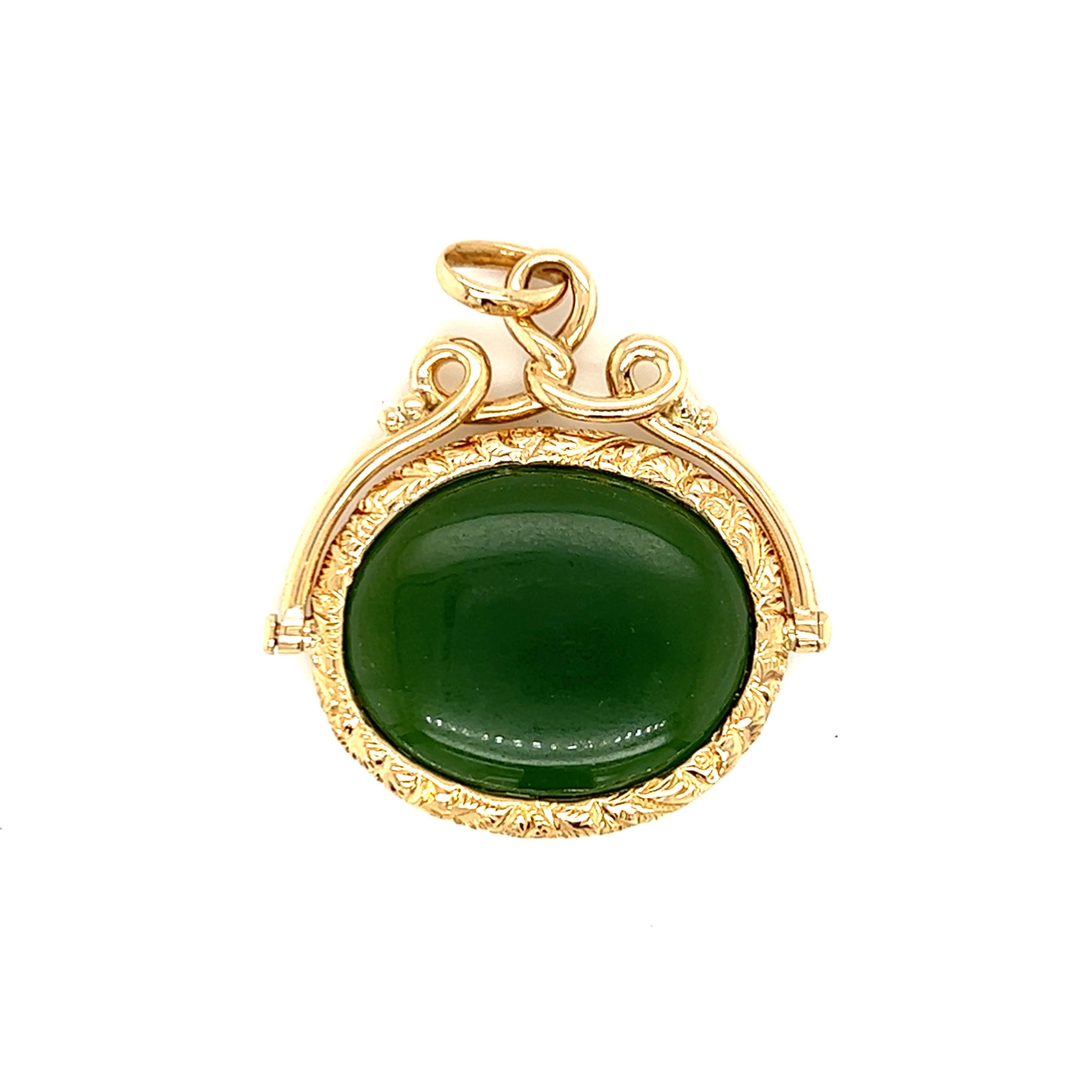 One early 20th-century oval jade intaglio watch fob pendant set in 14-karat solid rose gold. The pendant is stamped 14K with a hallmark. The pendant measures 1.5 inches long and 1.25 inches wide and weighs 7.9 grams. 


