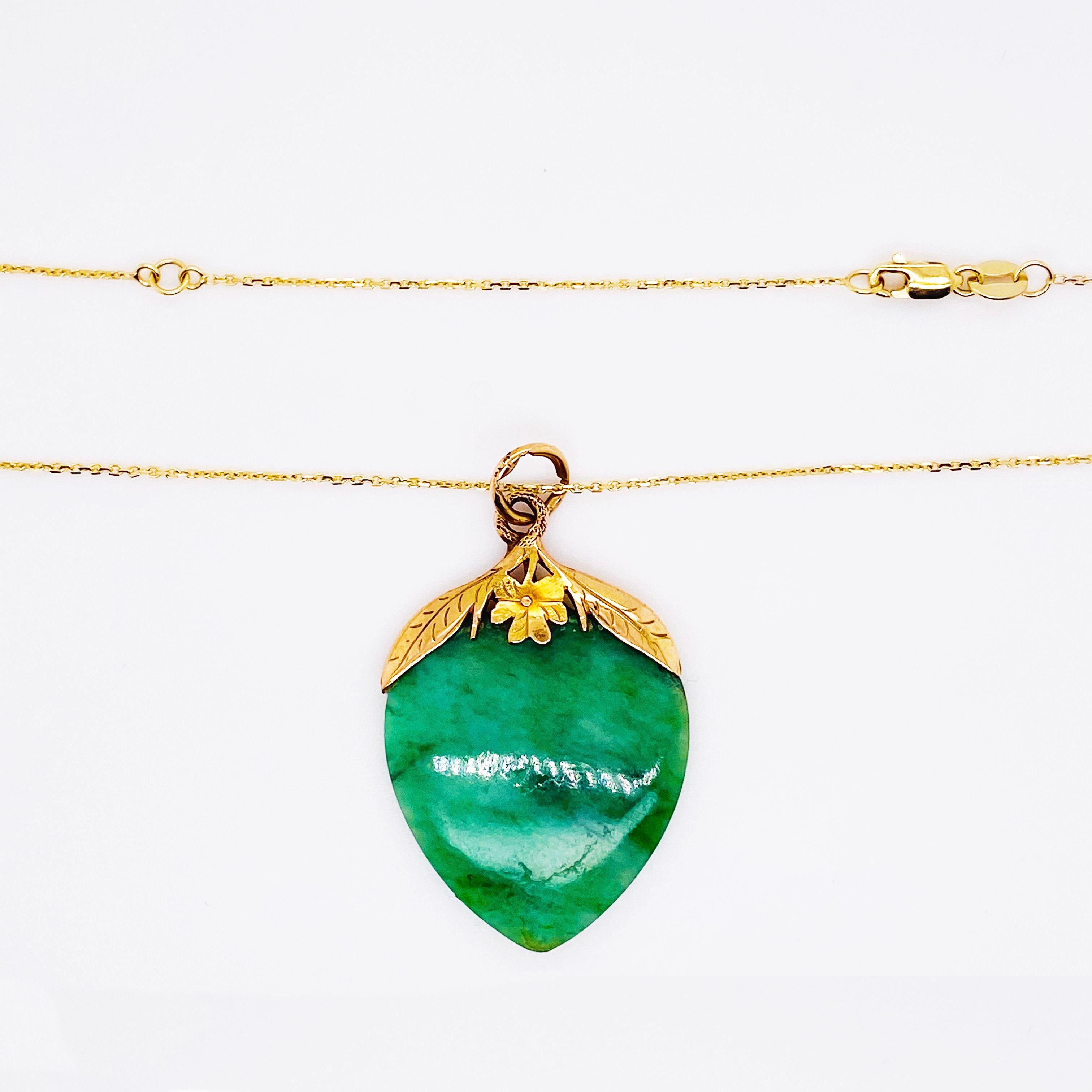 Protection for yourself! This is an awesome antique, rare leaf, petal jadeite jade pendant! The jade is a very vibrant, deep jade with a vibrant natural green color that very striking. Leafs and petals are known to give good luck when worn and jade