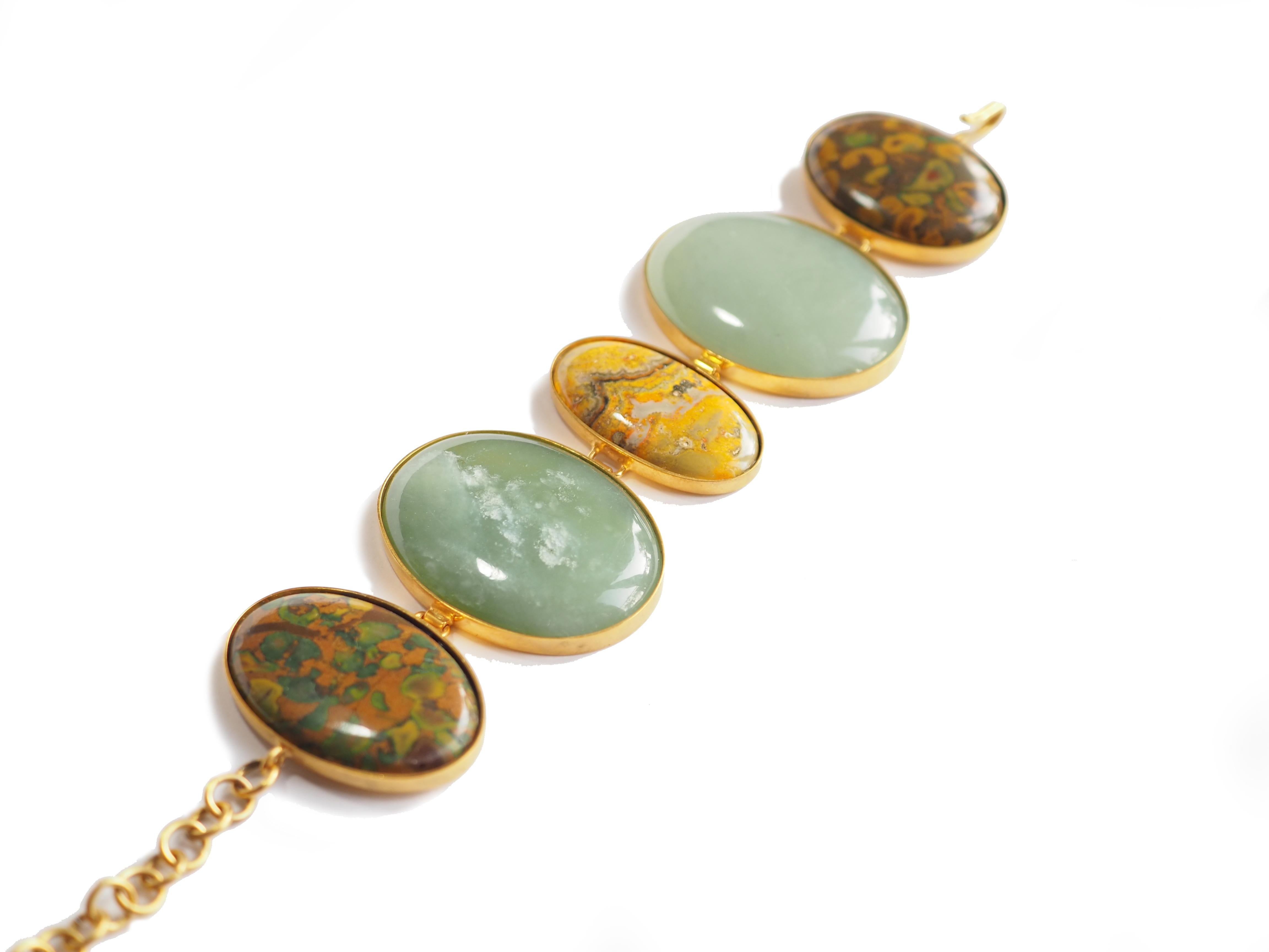 Amazing bracelet with cabochon jade and jasper stone linked in bronze, adjustable max up to 21cm.
All Giulia Colussi jewelry is new and has never been previously owned or worn. Each item will arrive at your door beautifully gift wrapped in our