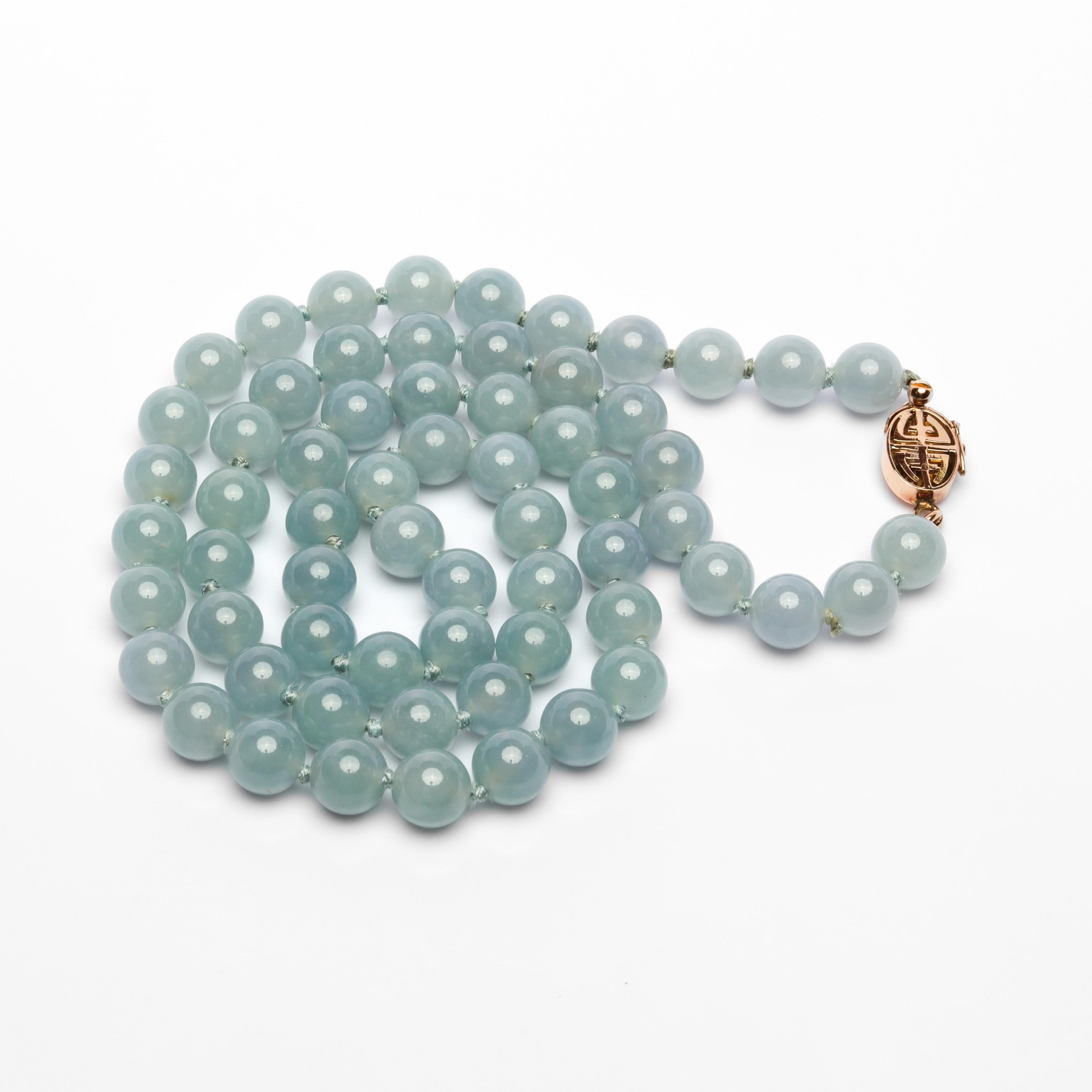 This is a breathtakingly beautiful and rare natural and untreated light blue jadeite jade necklace by the iconic San Francisco retailer, Gump's. This astonishing 23