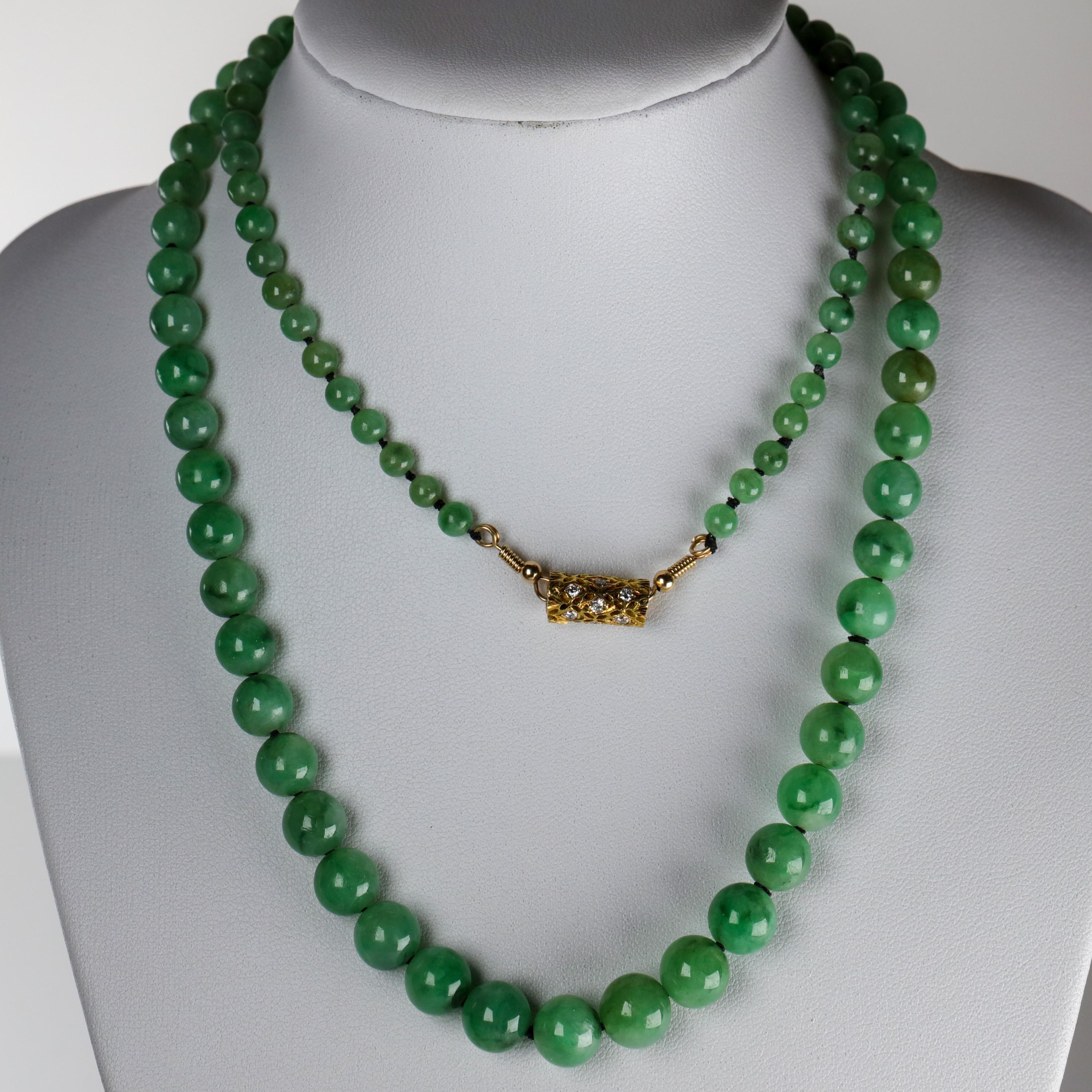 This very fine jade necklace has been certified by global jade authority, Mason Kay, to be natural and untreated jadeite jade. But anyone who really *knows* jade would need no certificate to inform them that this dense, luminous,