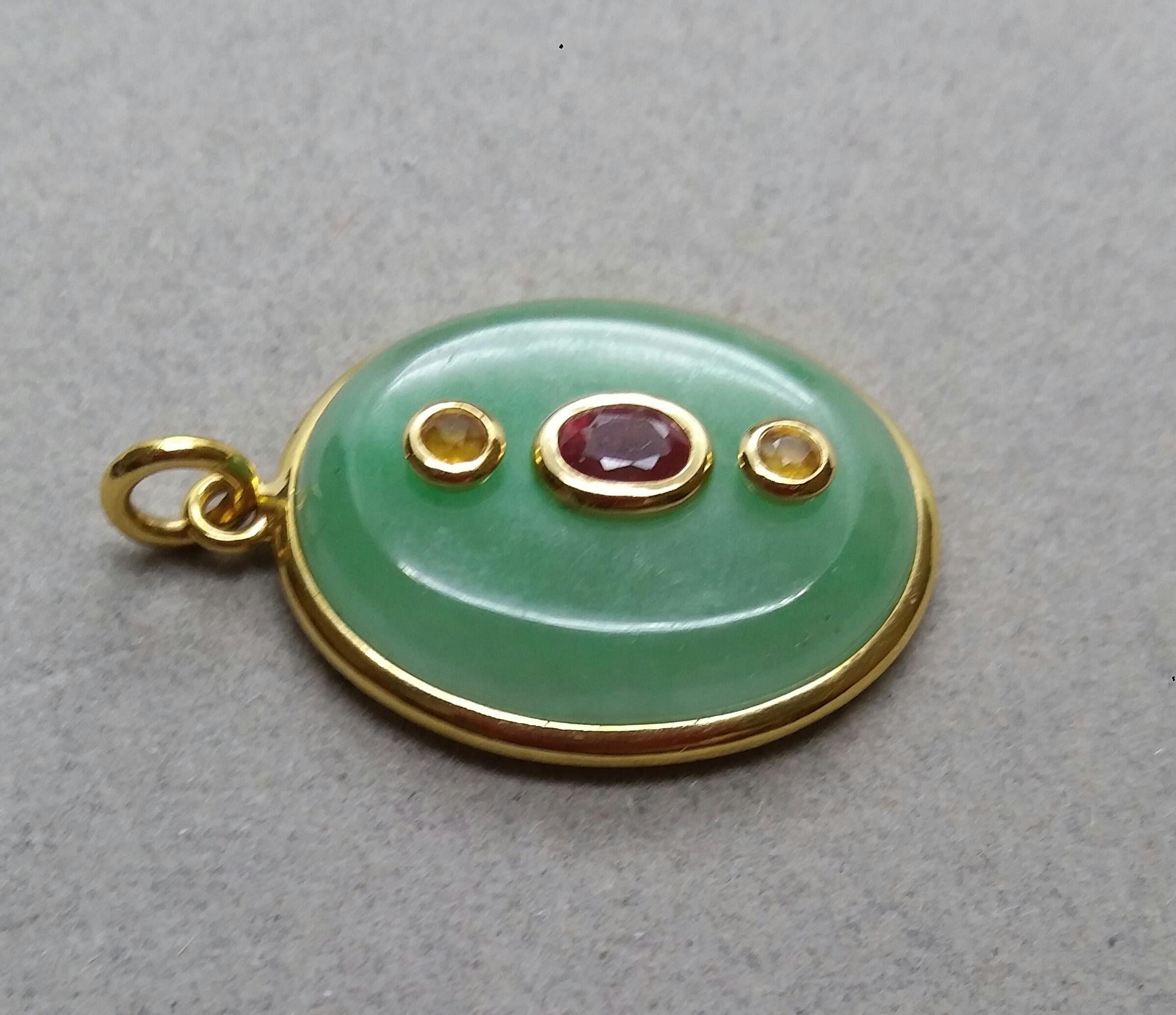 Oval Cut Jade Oval Cabochon Oval Faceted Ruby Yellow Sapphire 18 Kt Yellow Gold Pendant For Sale
