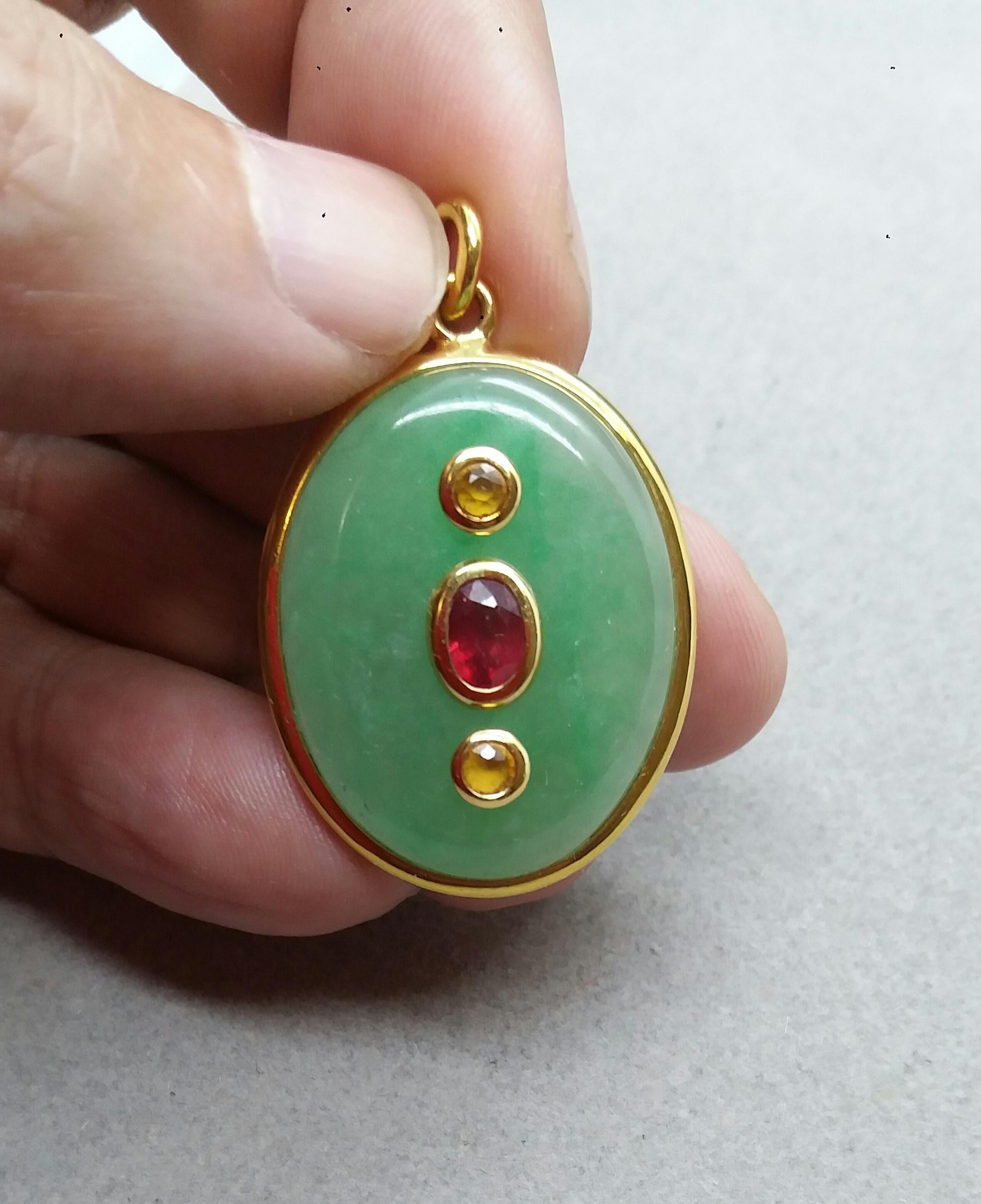 Jade Oval Cabochon Oval Faceted Ruby Yellow Sapphire 18 Kt Yellow Gold Pendant In Good Condition For Sale In Bangkok, TH