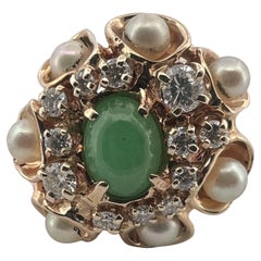 Jade, pearls, and diamonds yellow gold ring