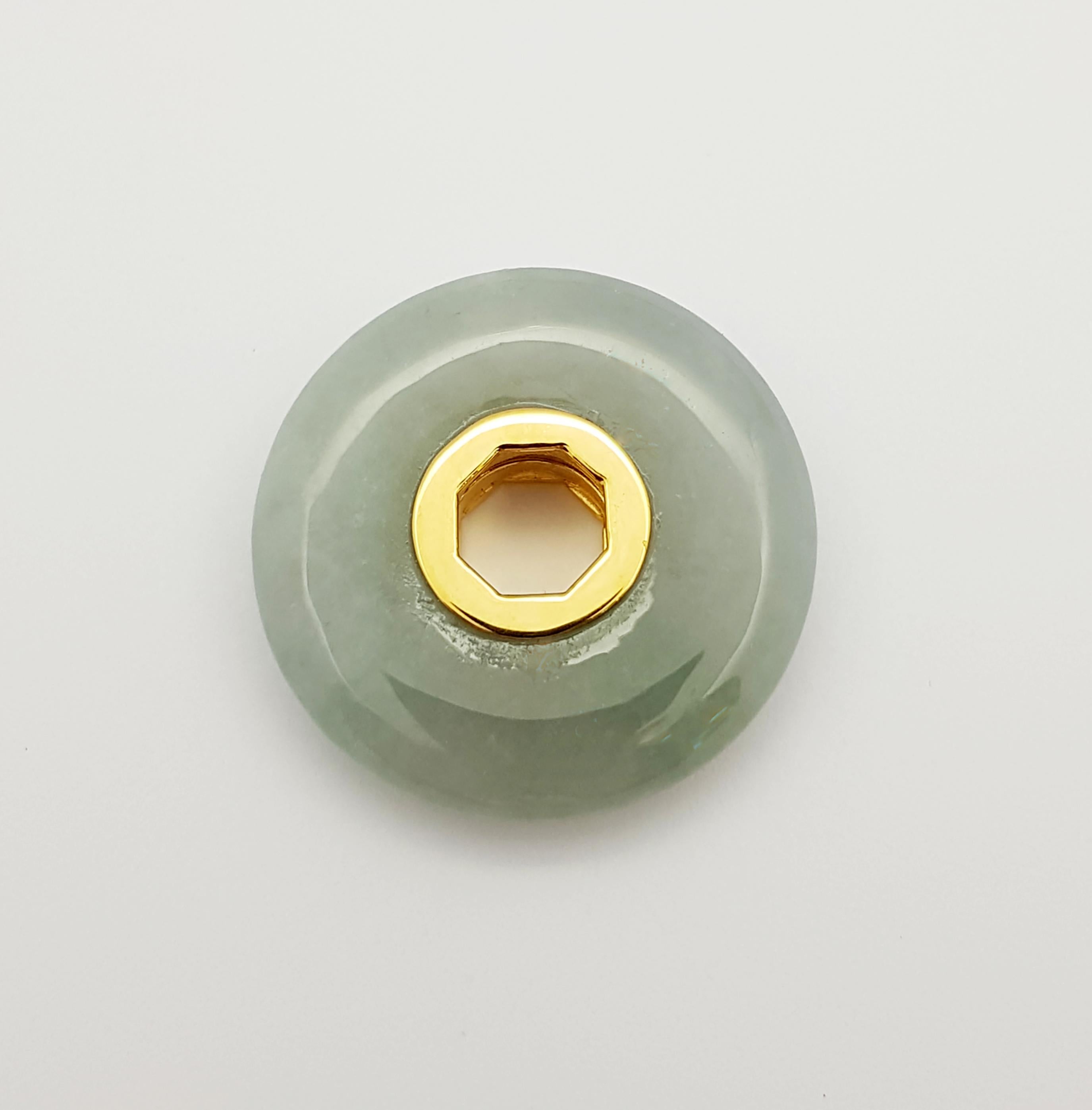 Round Cut Jade Pendant set in 18 Karat Gold Settings  For Sale