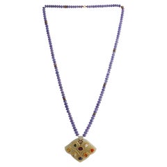 Jade Pendant Studded with Nine Lucky Gems Strung in a Tanzanite Beads Necklace