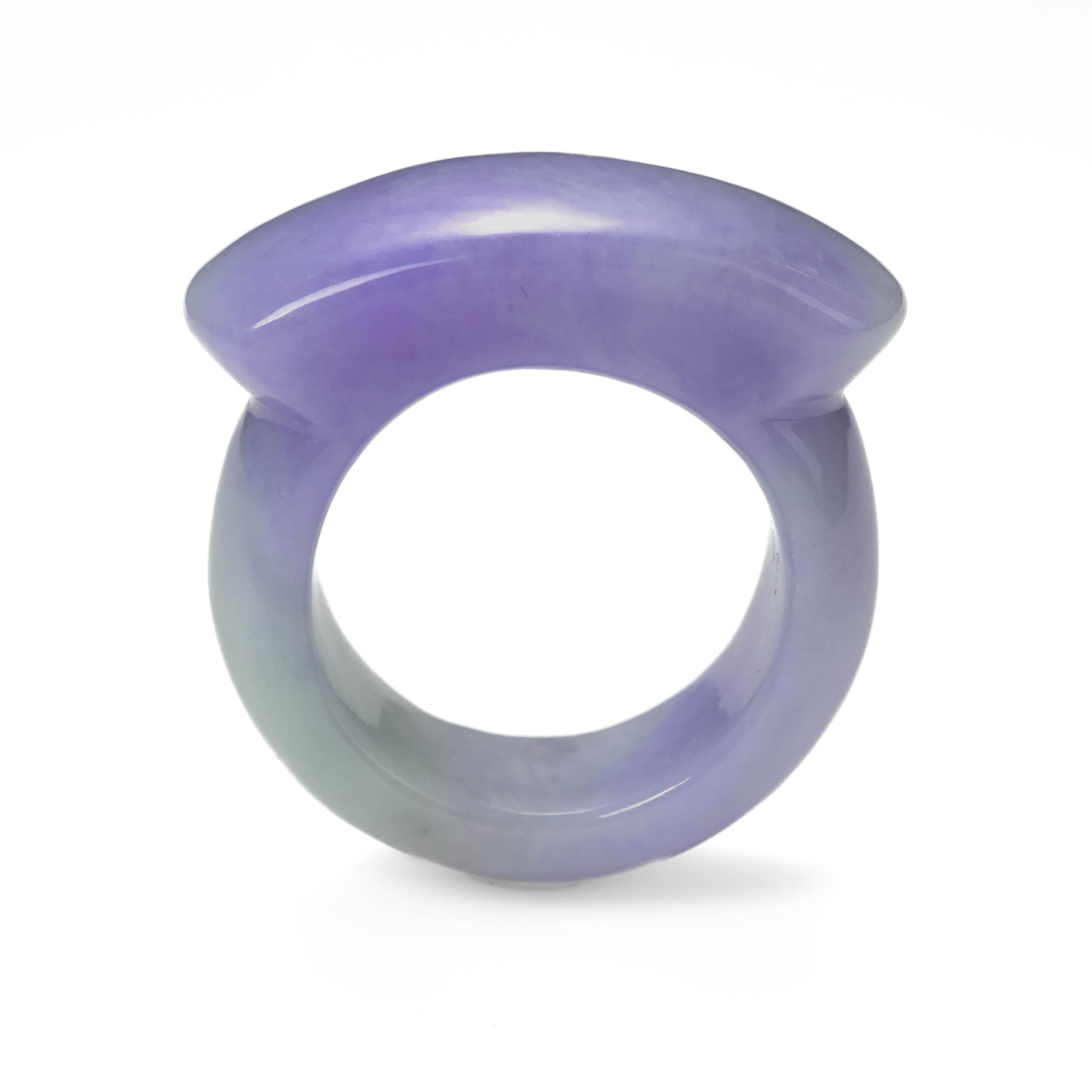 This extraordinary ring was hand-carved from a single piece or natural and untreated GIA-Certified Burmese jadeite jade. The translucent stone is purple with a hint of light green.  Click on the image of the GIA certificate and you will see that it