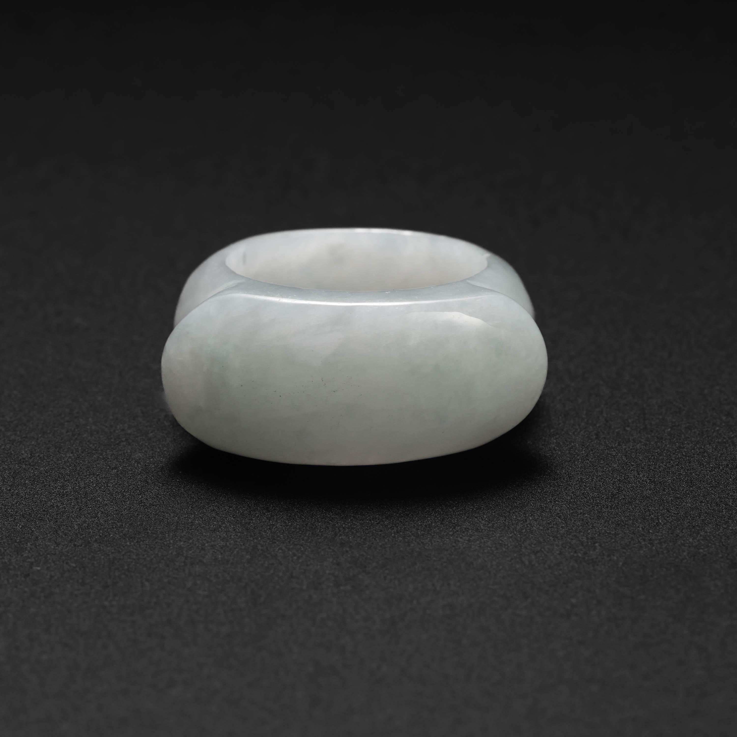 This ring was carved from a single piece of certified natural and untreated Burmese jadeite jade. The gleaming high-polish creates a circle of reflected light all the way around the band. And the high-translucency of the stone makes the ring appear