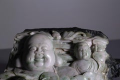 Jade sculpture with buddha and child