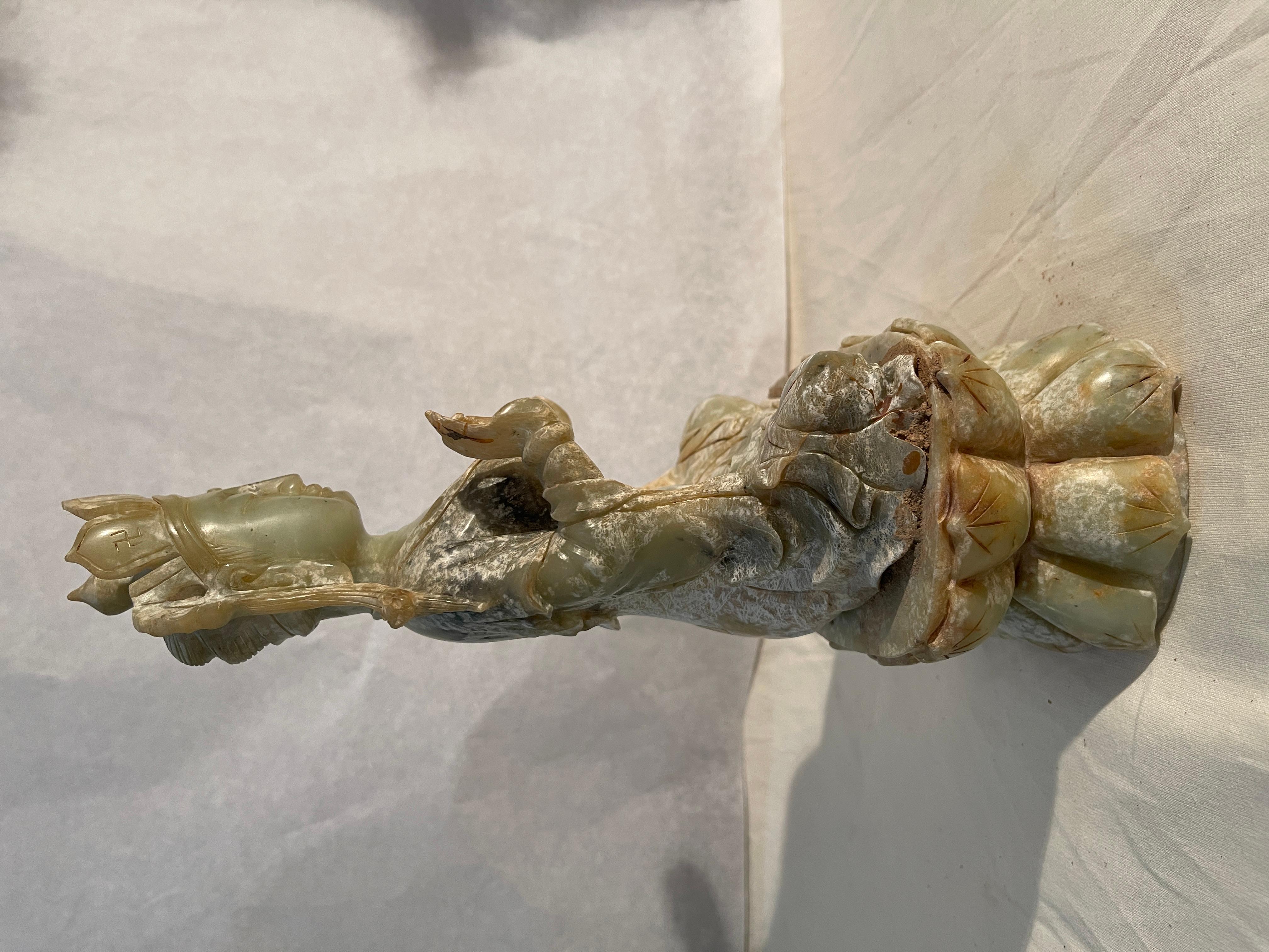 Jade statue, goddess Guanyin with lotus flower, China, 18th-19th century
Refined ancient jade, depicting the goddess Guanyin with a lotus flower in her hand.
Good condition, as shown in the photo, a small defect on one hand is visible.
Dimensions: