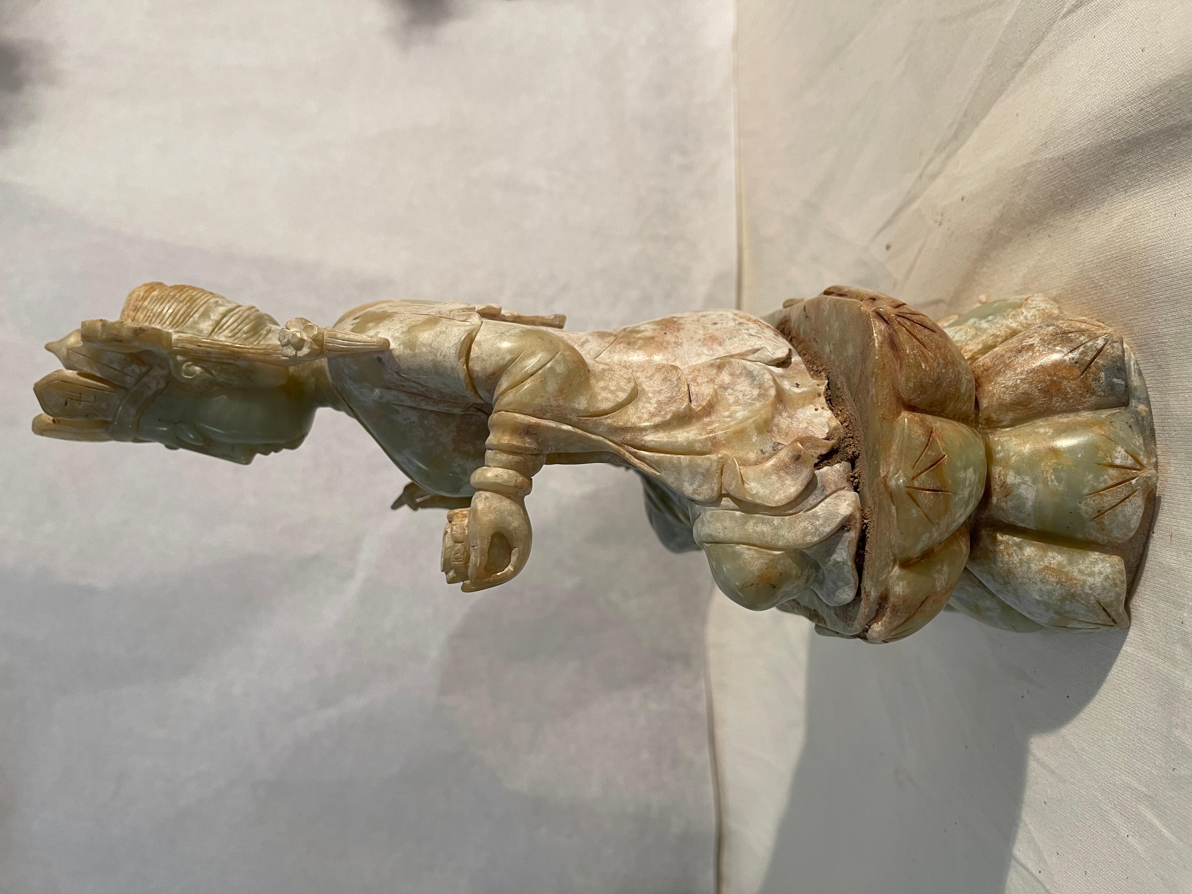 Chinese Jade statue, goddess Guanyin with lotus flower, China, 18th-19th century For Sale