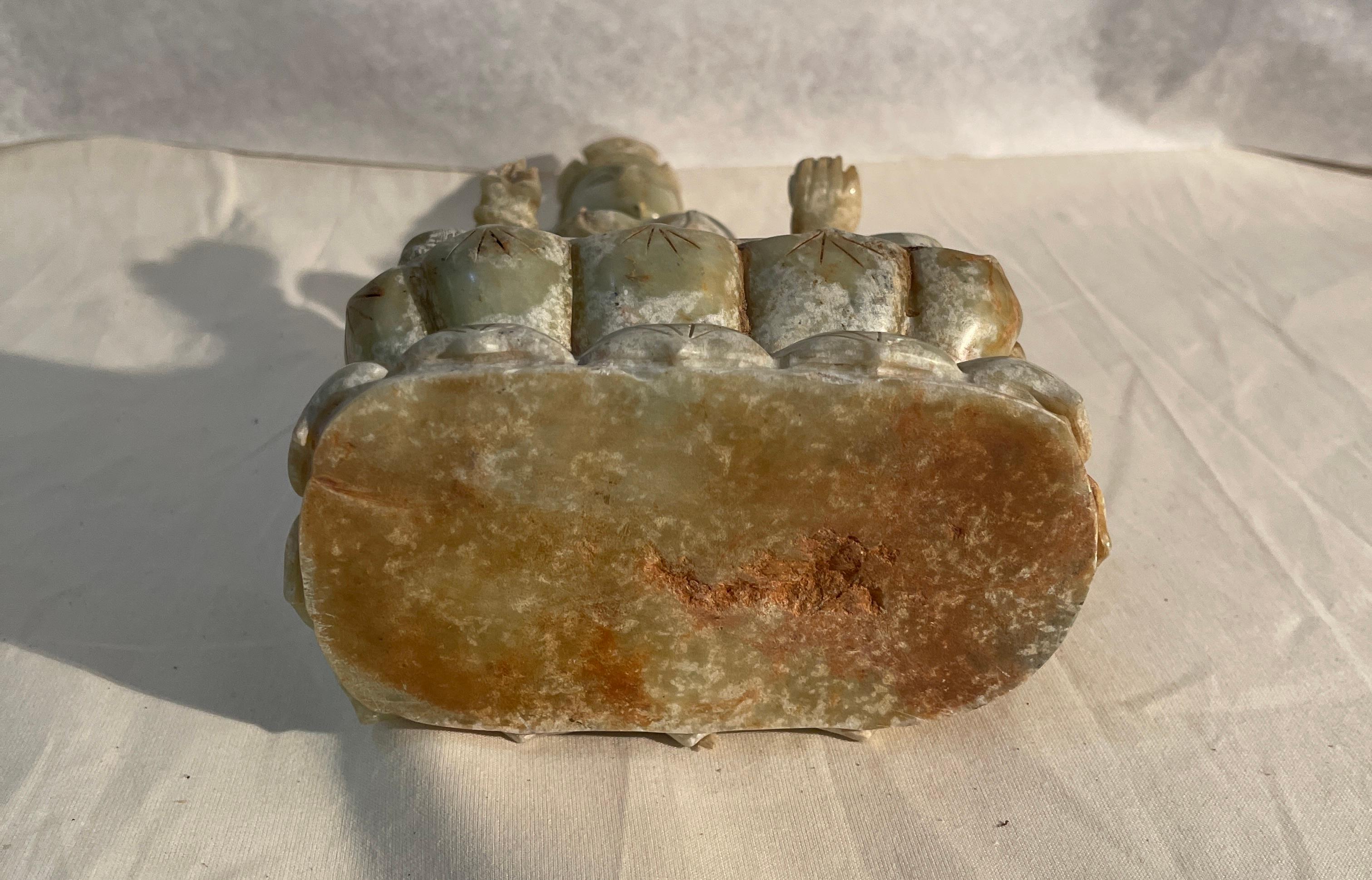 Hand-Carved Jade statue, goddess Guanyin with lotus flower, China, 18th-19th century For Sale