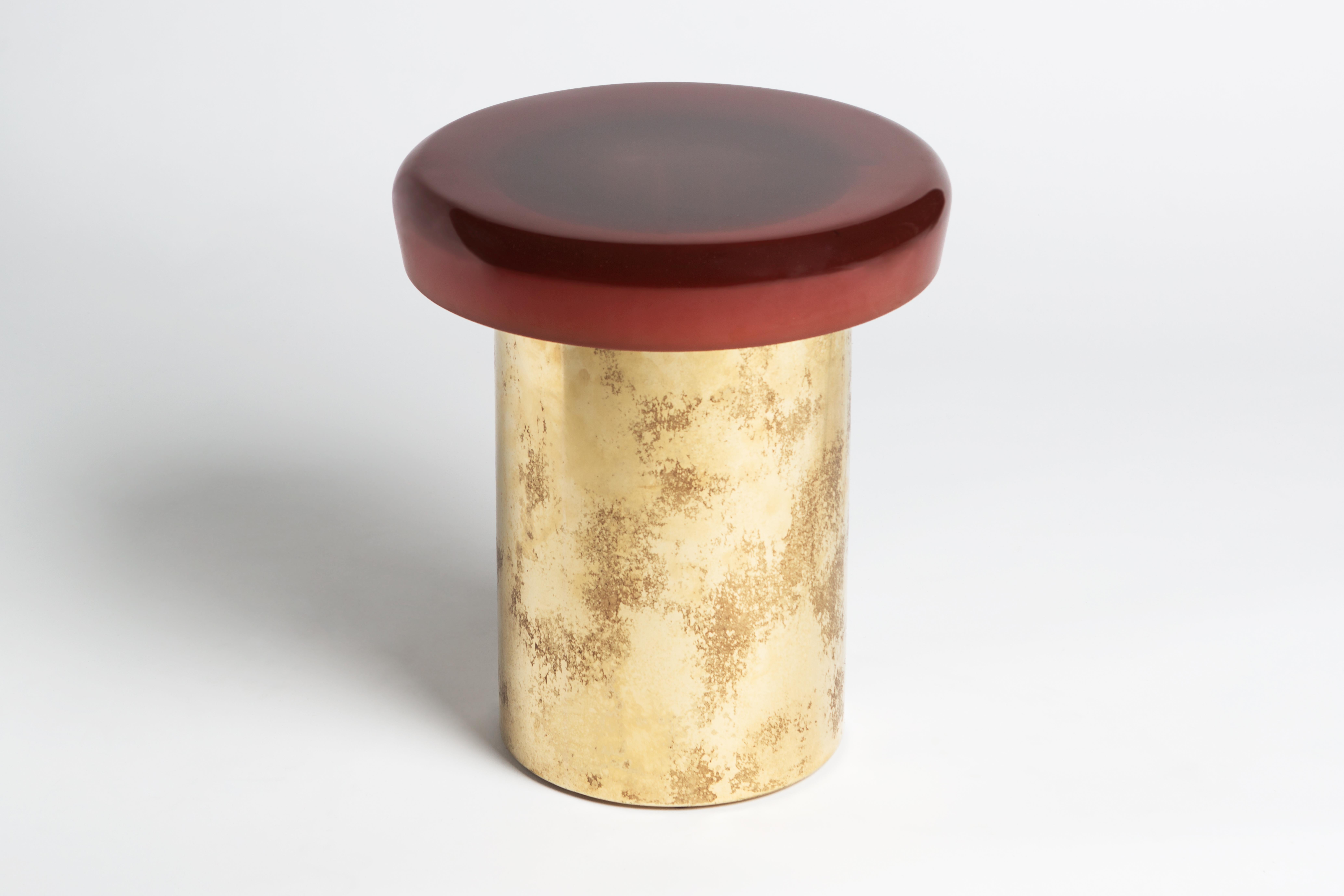 Jade stool by Draga & Aurel
Dimensions: W 40, D 40, H 46, top Ø 40 cm
Materials: Resin and bronze

Formed from a combination of reflective resin and solid brass, the Jade coffee tables look like precious gems. The surface is made by hand in resin of